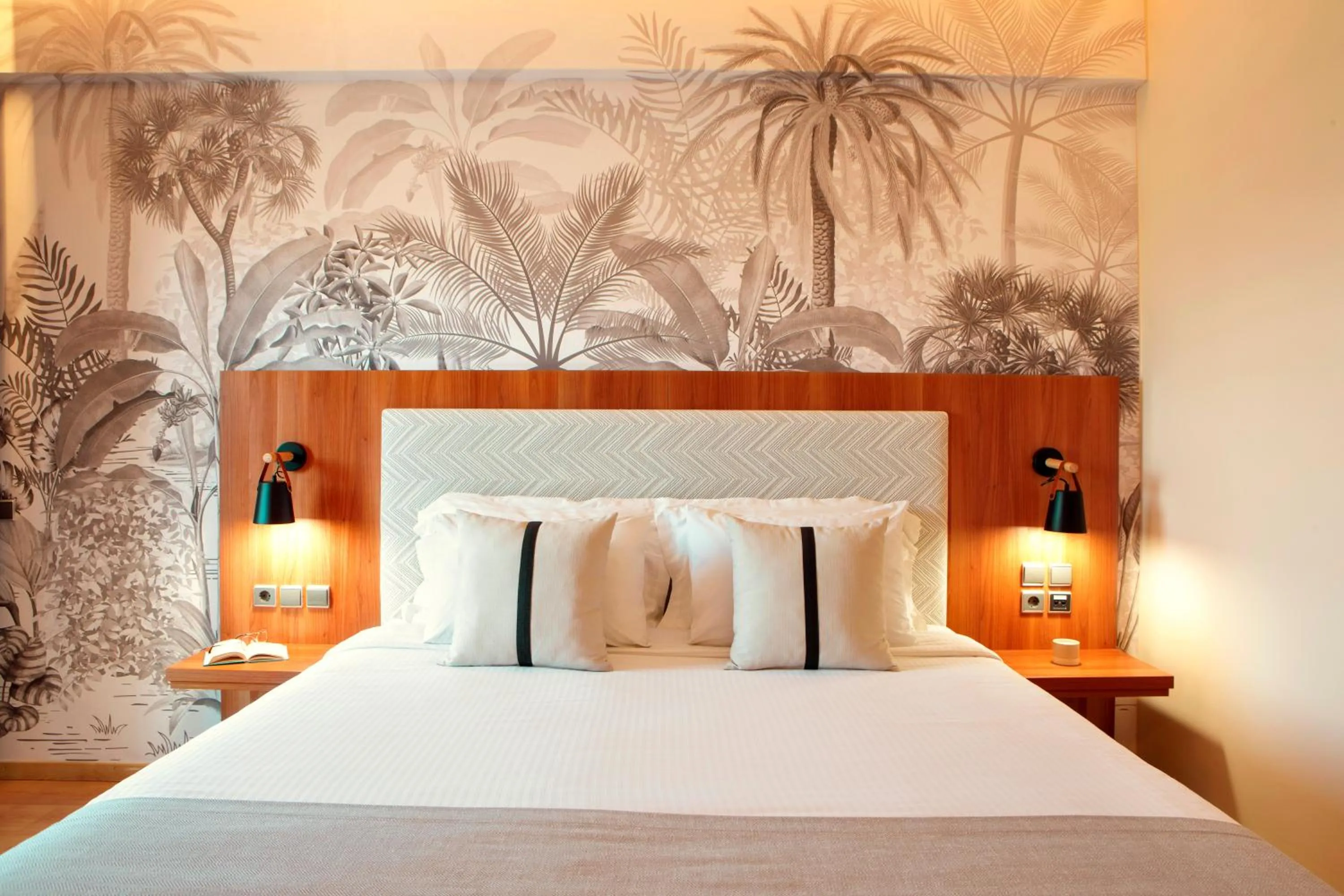 Bed in Zeus Essence Ramada by Wyndham Athens