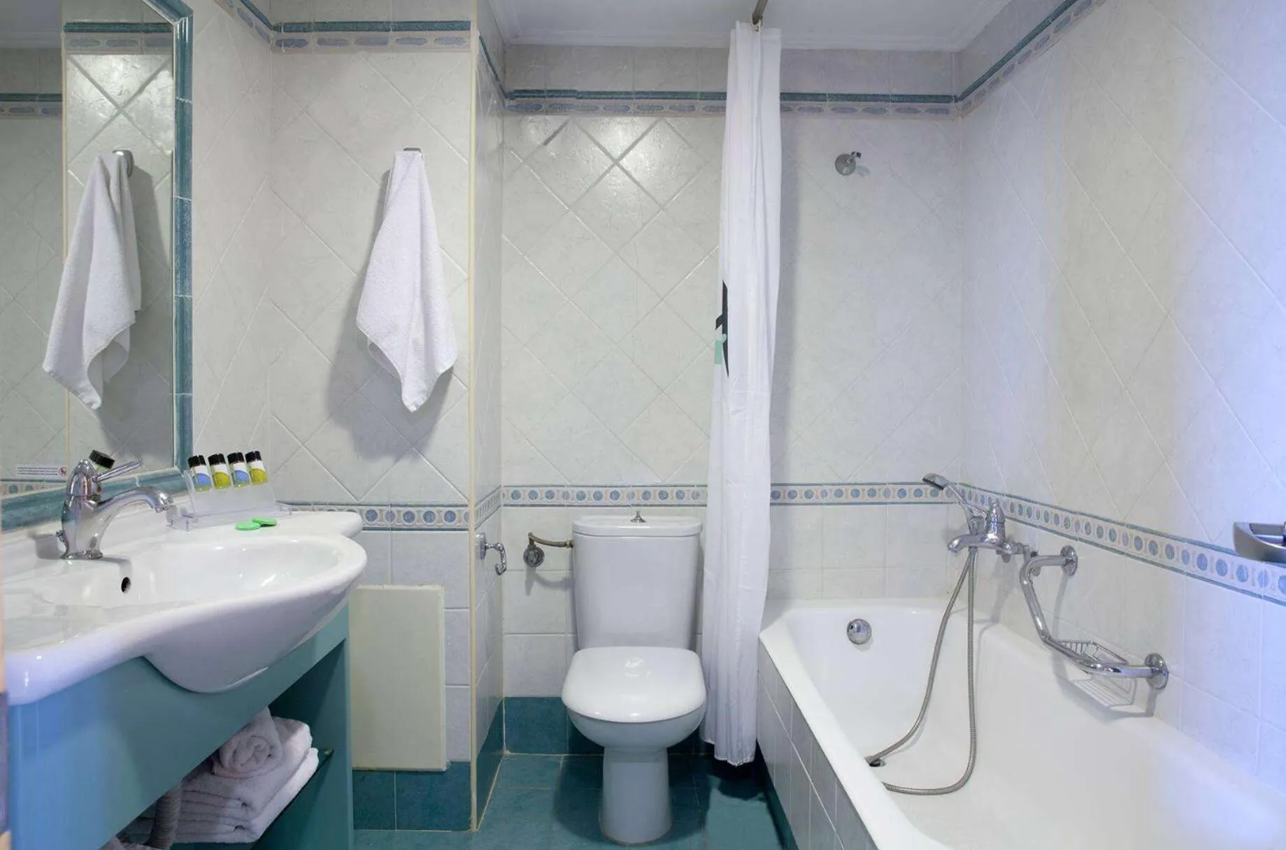 TV and multimedia in Zeus Essence Ramada by Wyndham Athens