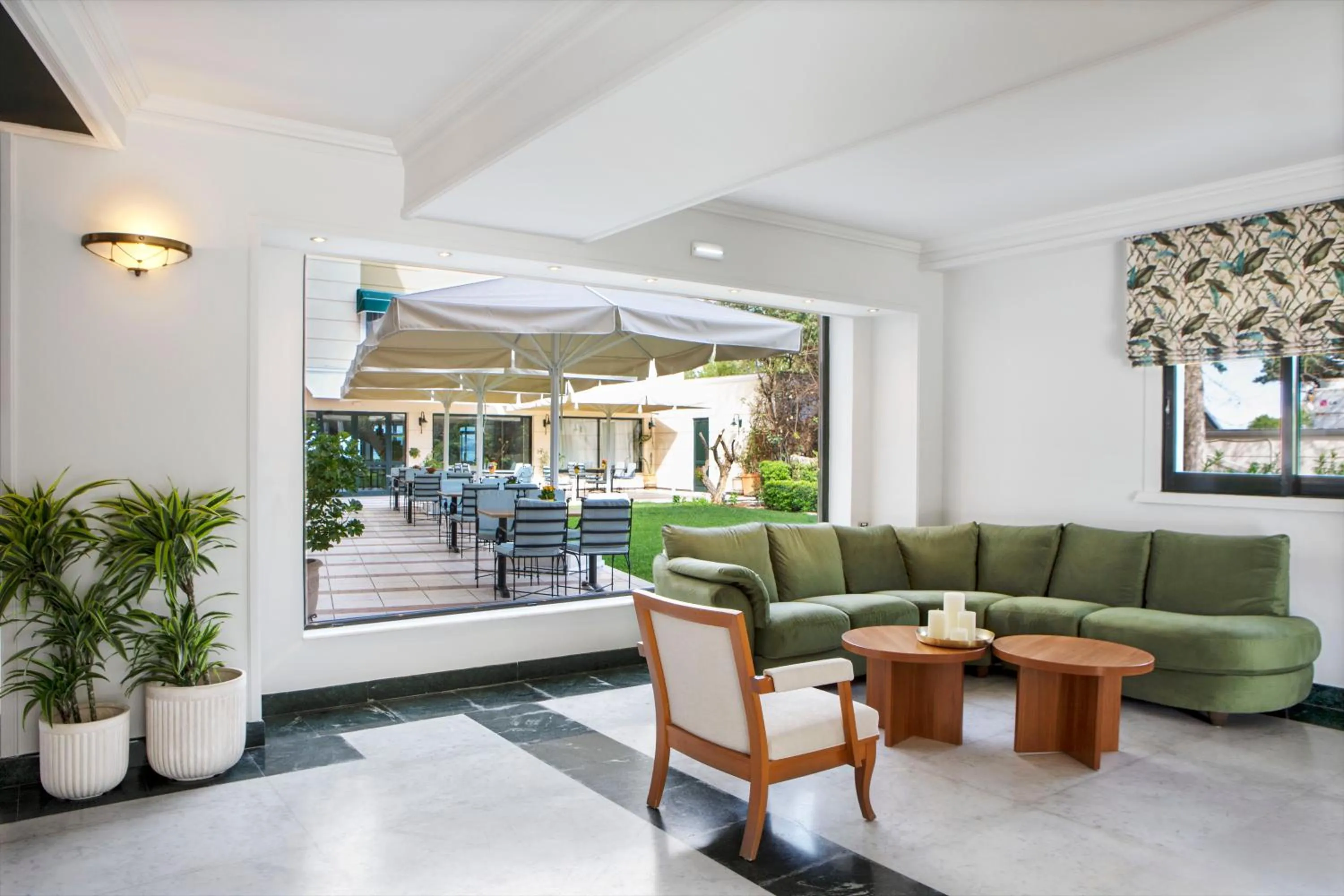 Lobby or reception in Zeus Essence Ramada by Wyndham Athens