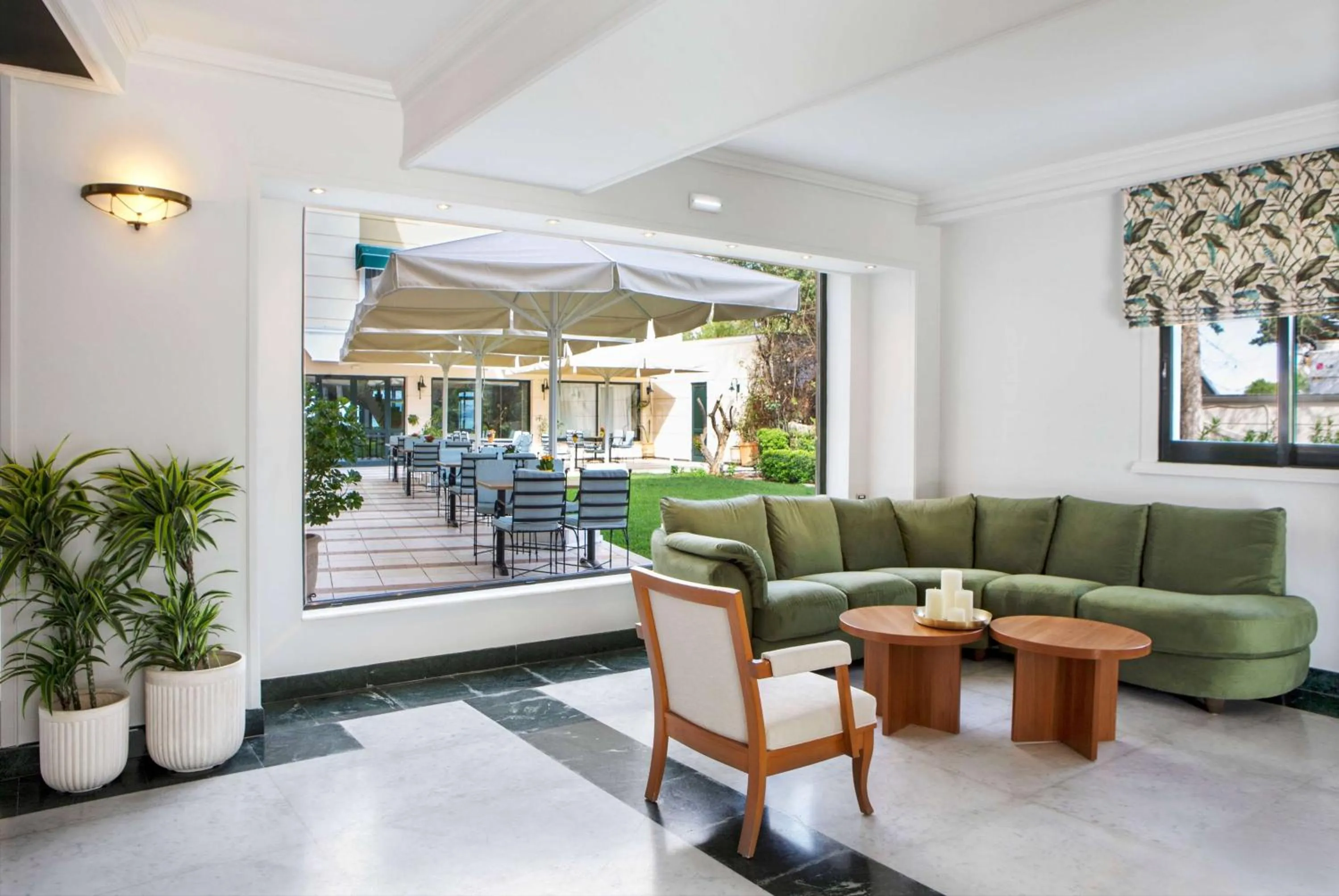 Lobby or reception in Zeus Essence Ramada by Wyndham Athens