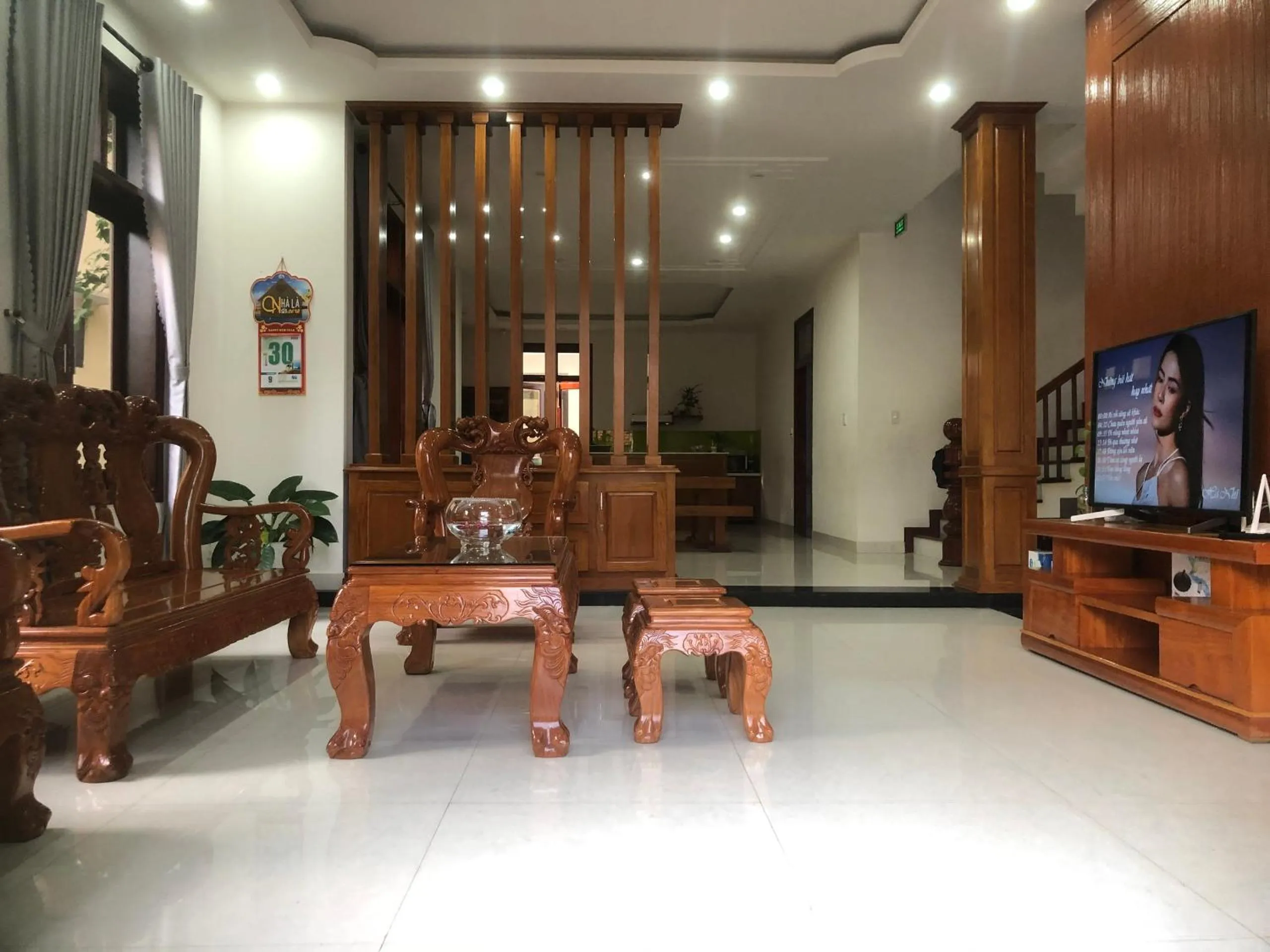 Communal lounge/ TV room in Homestay Phương House