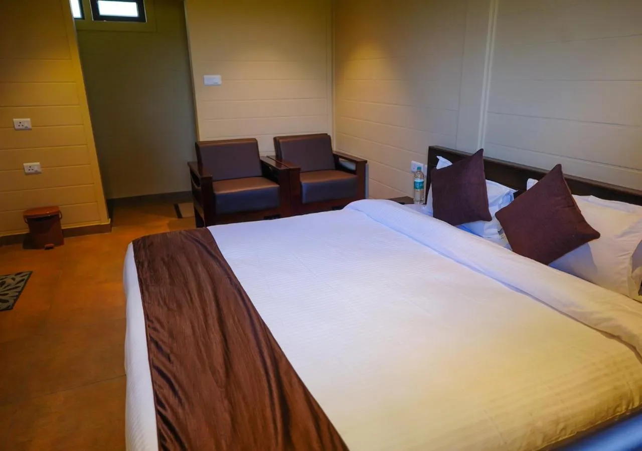 Bed in Niyatma Wayanad Pool Resort by VOYE HOMES - Inside Coffee Plantation