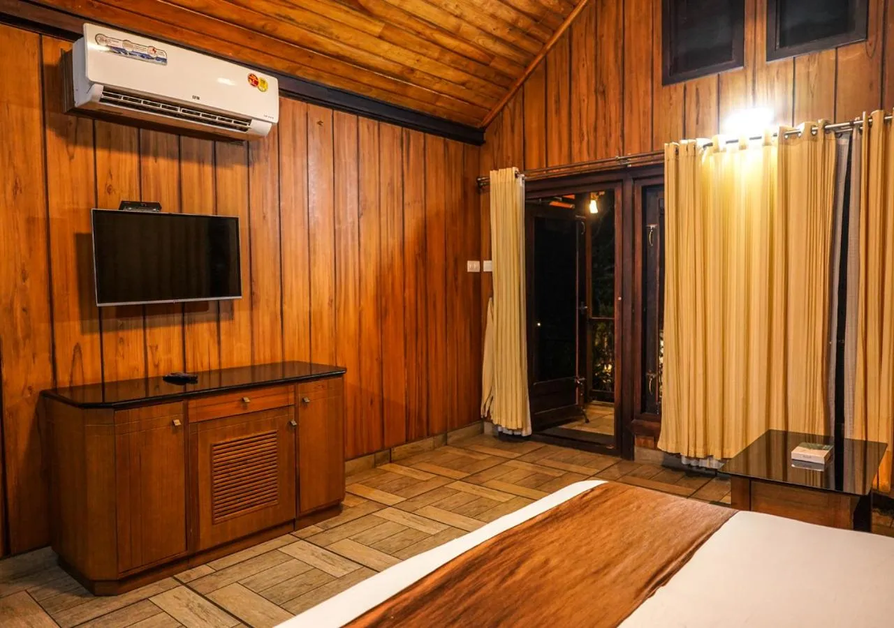 Bed in Niyatma Wayanad Pool Resort by VOYE HOMES - Inside Coffee Plantation