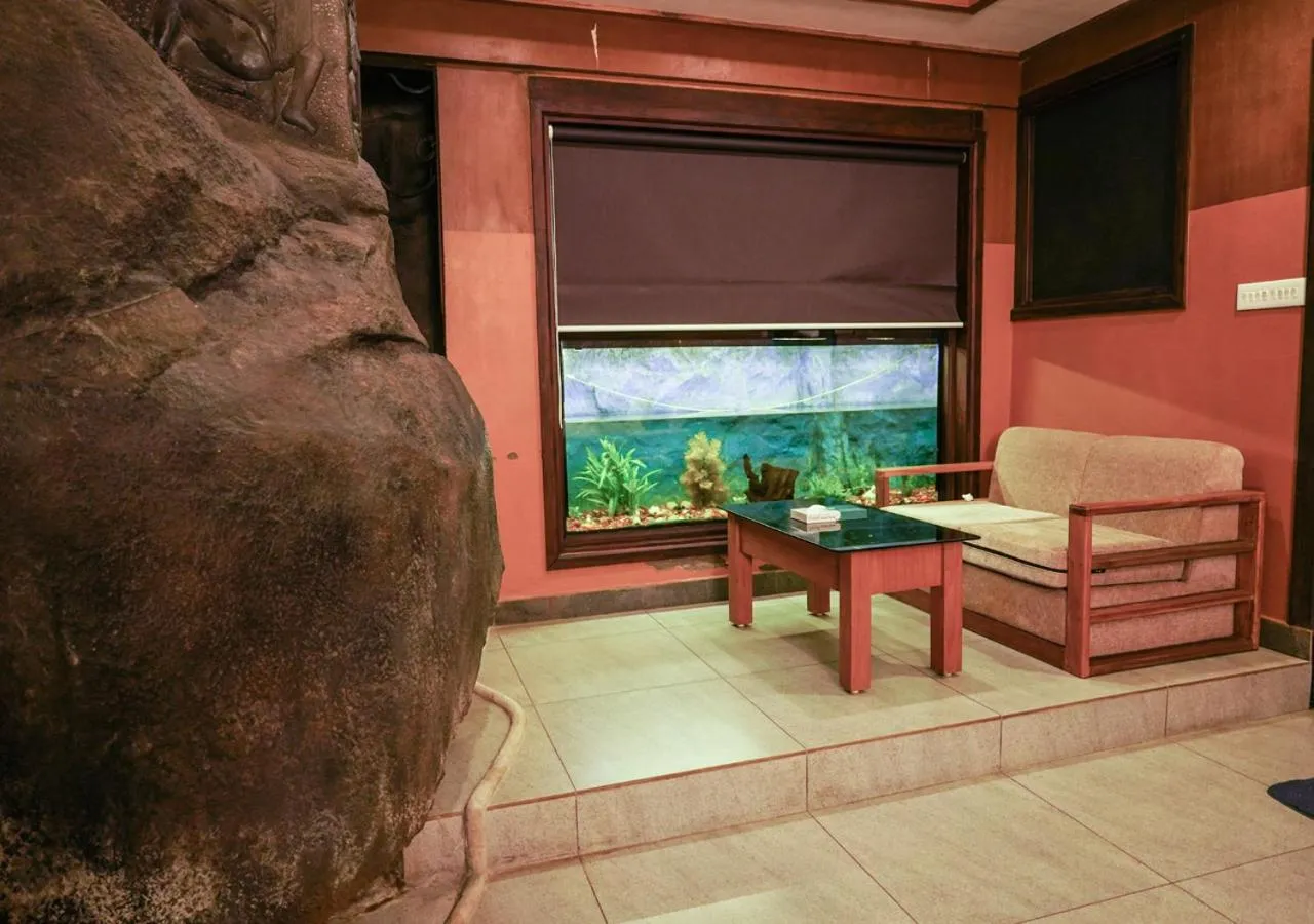 Living room in Niyatma Wayanad Pool Resort by VOYE HOMES - Inside Coffee Plantation