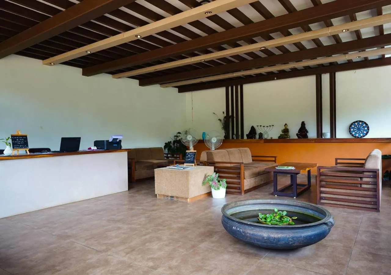 Lobby or reception in Niyatma Wayanad Pool Resort by VOYE HOMES - Inside Coffee Plantation