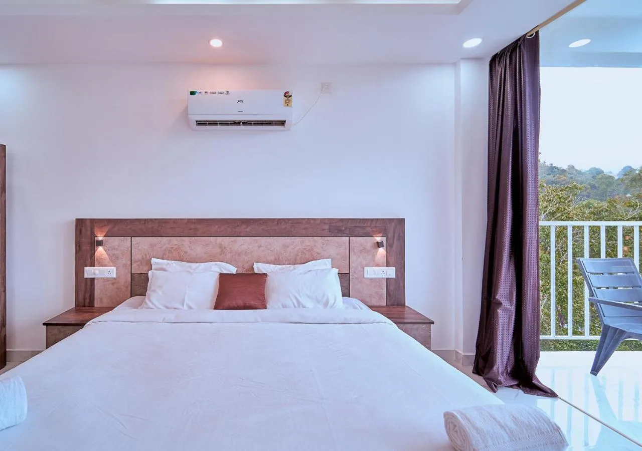 Bed in Niyatma Wayanad Pool Resort by VOYE HOMES - Inside Coffee Plantation