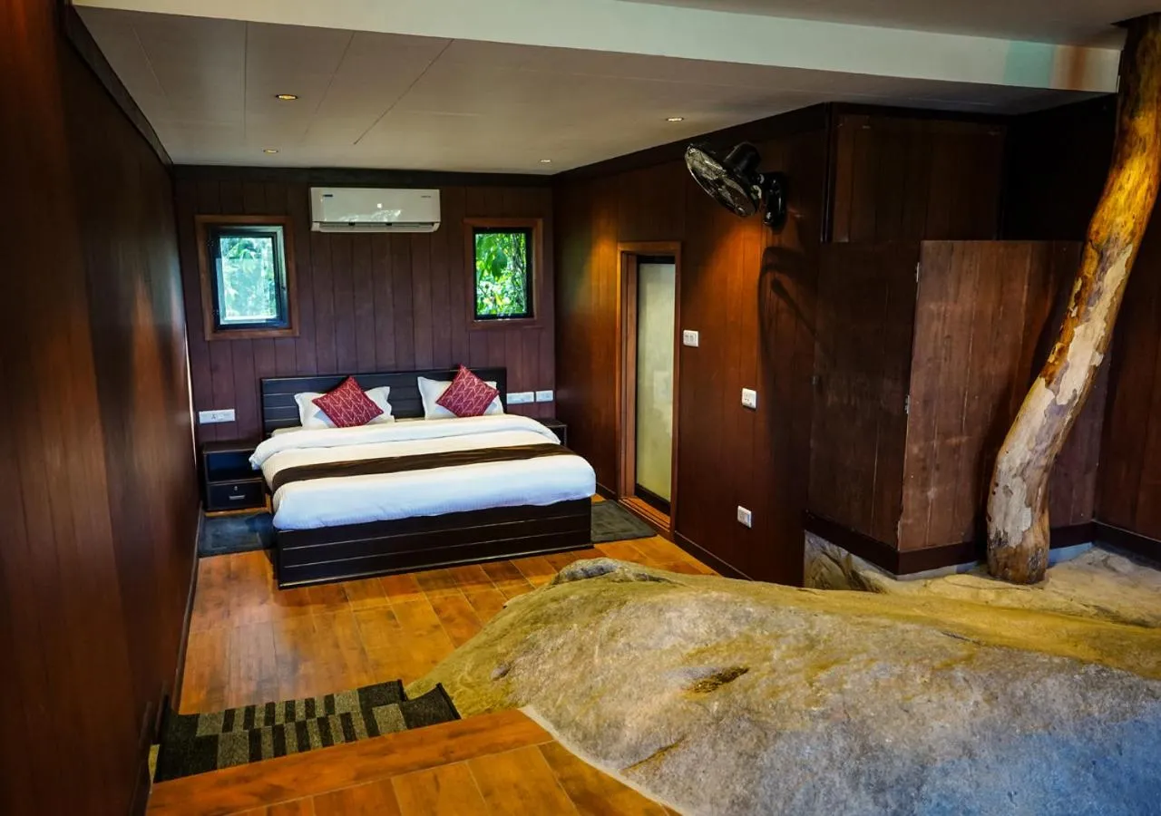 Bed in Niyatma Wayanad Pool Resort by VOYE HOMES - Inside Coffee Plantation