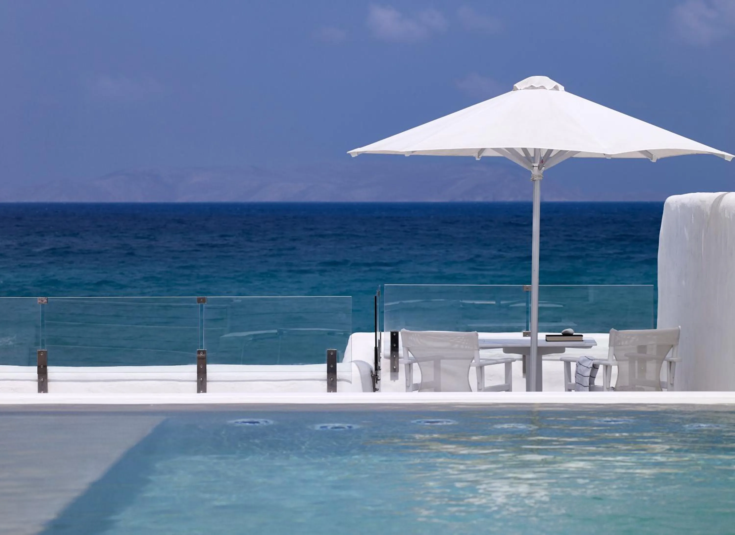 Balcony/Terrace, Swimming Pool in Knossos Beach Bungalows Suites Resort & Spa