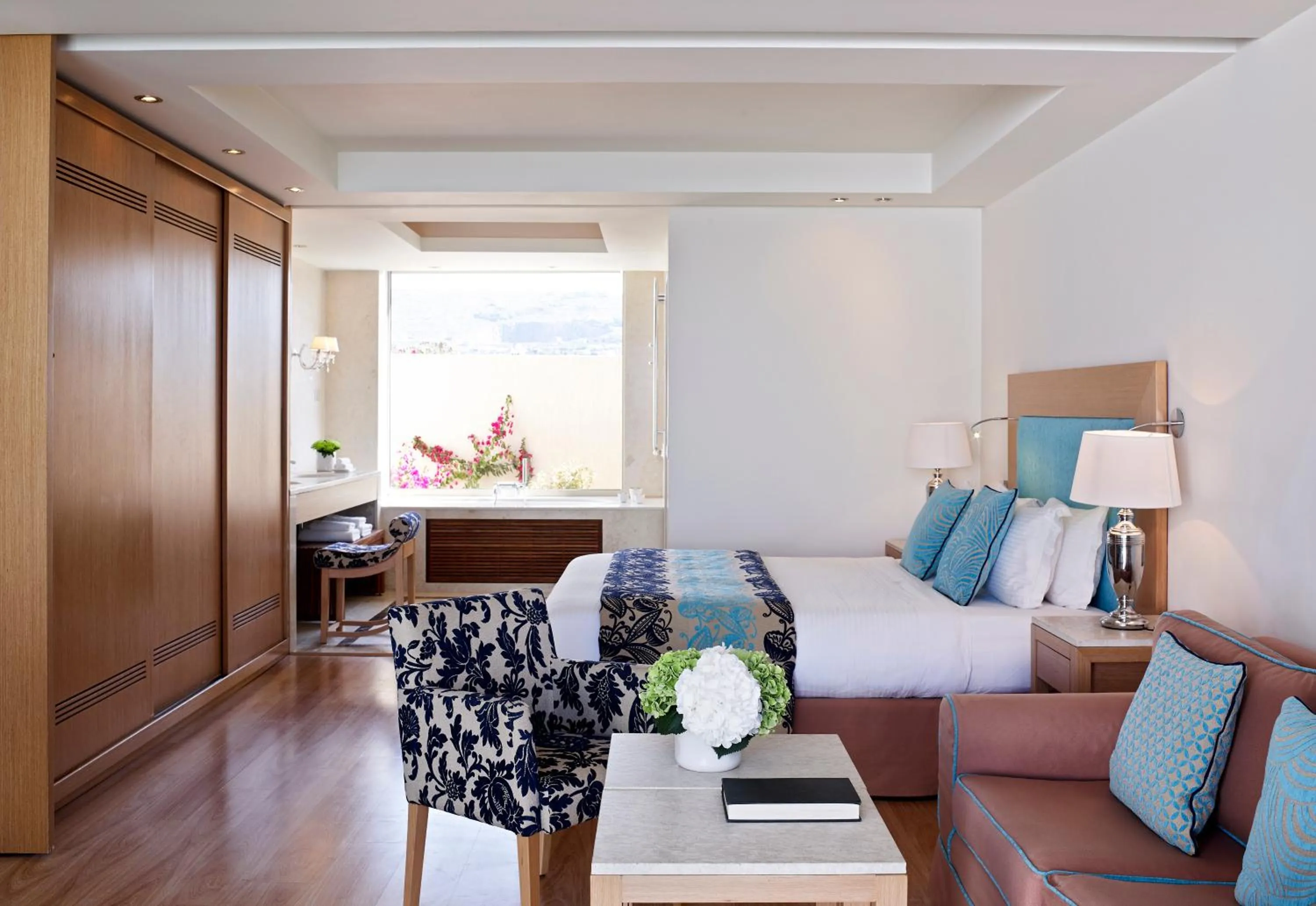 Bathroom, Bed in Knossos Beach Bungalows Suites Resort & Spa