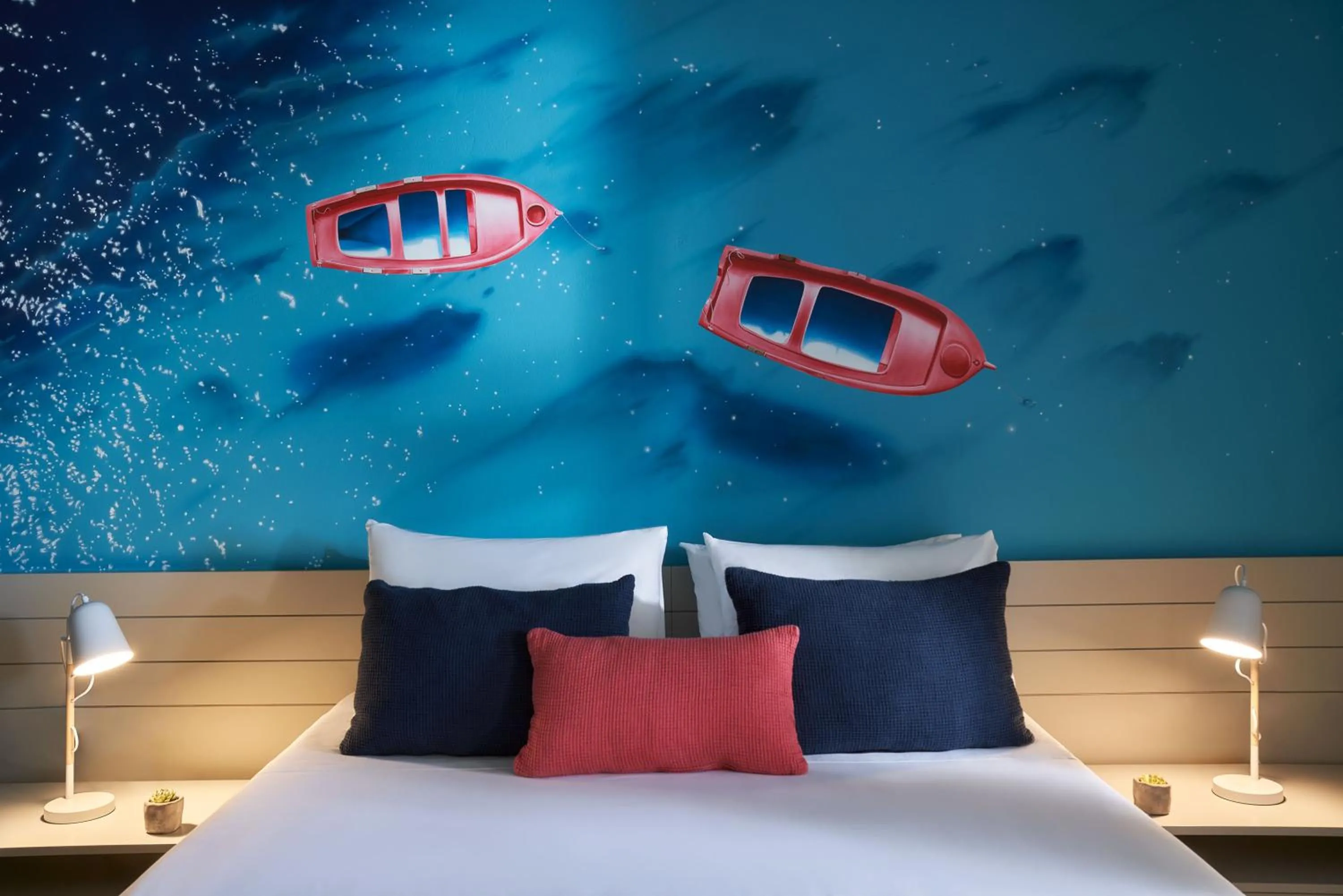 Bed in Poseidon of Paros Hotel & Spa