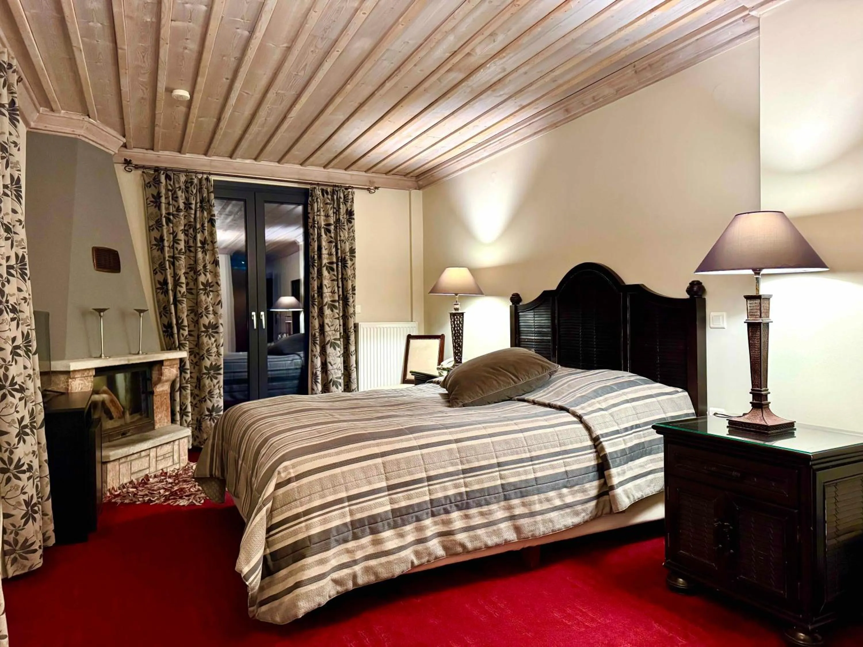 fireplace, Bed in Boutique Hotel Skamnos Arachova