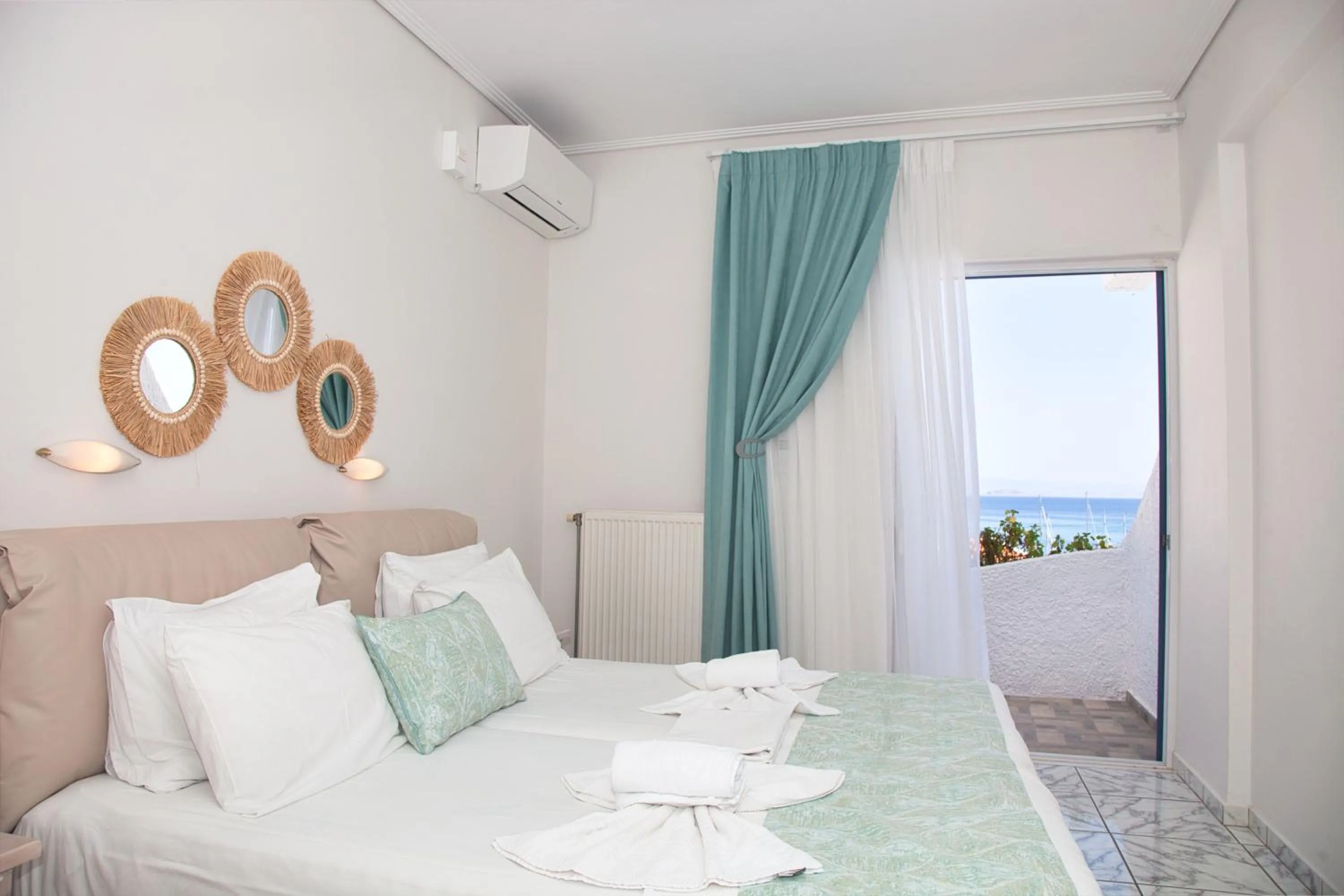 Photo of the whole room, Bed in The Milos