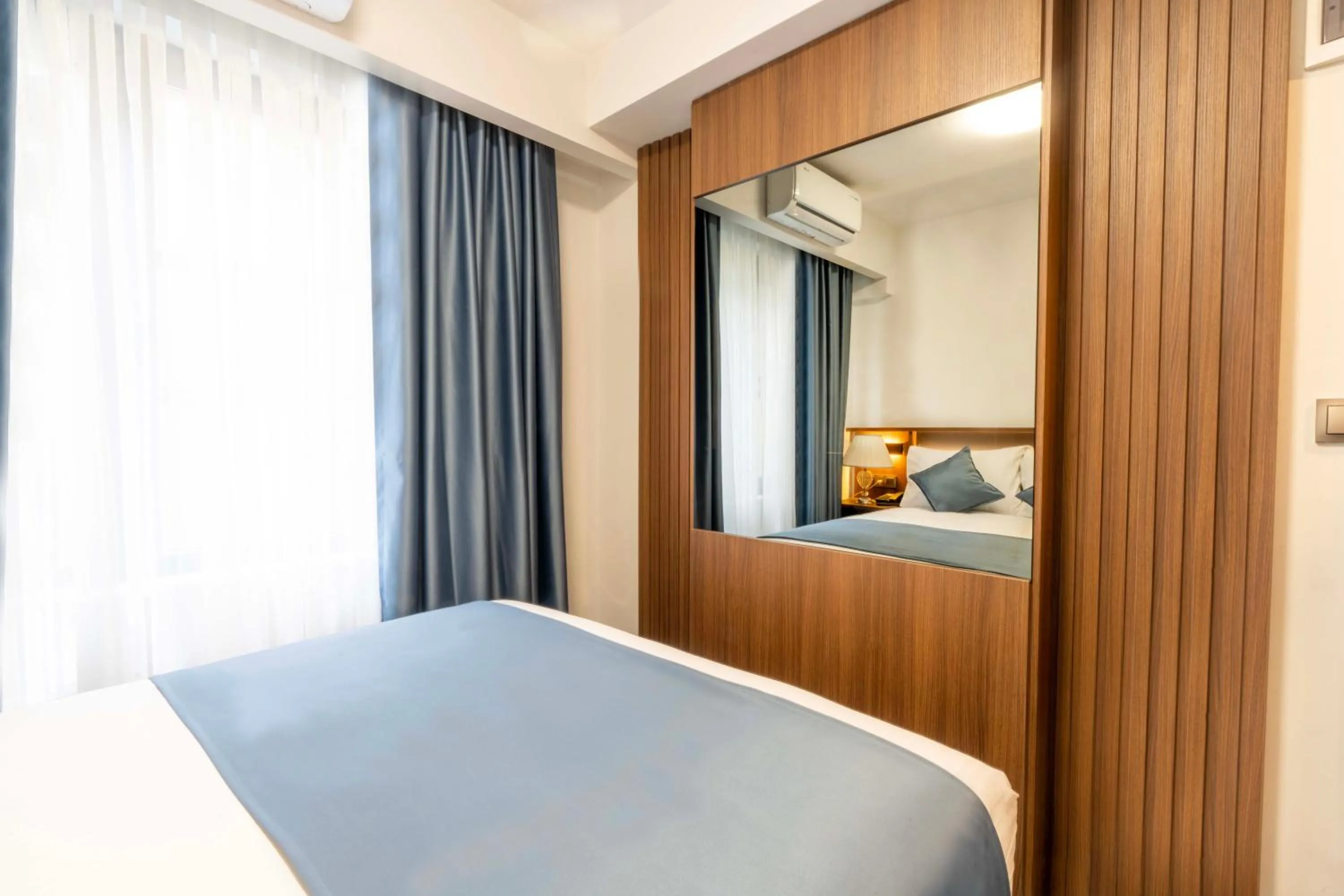 Photo of the whole room, Bed in THE BOSFOR HOTEL