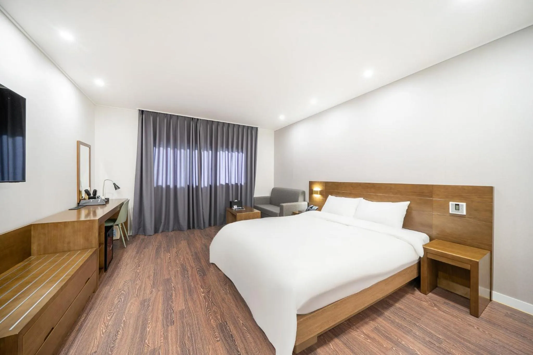 Bed in The 7 Business Hotel