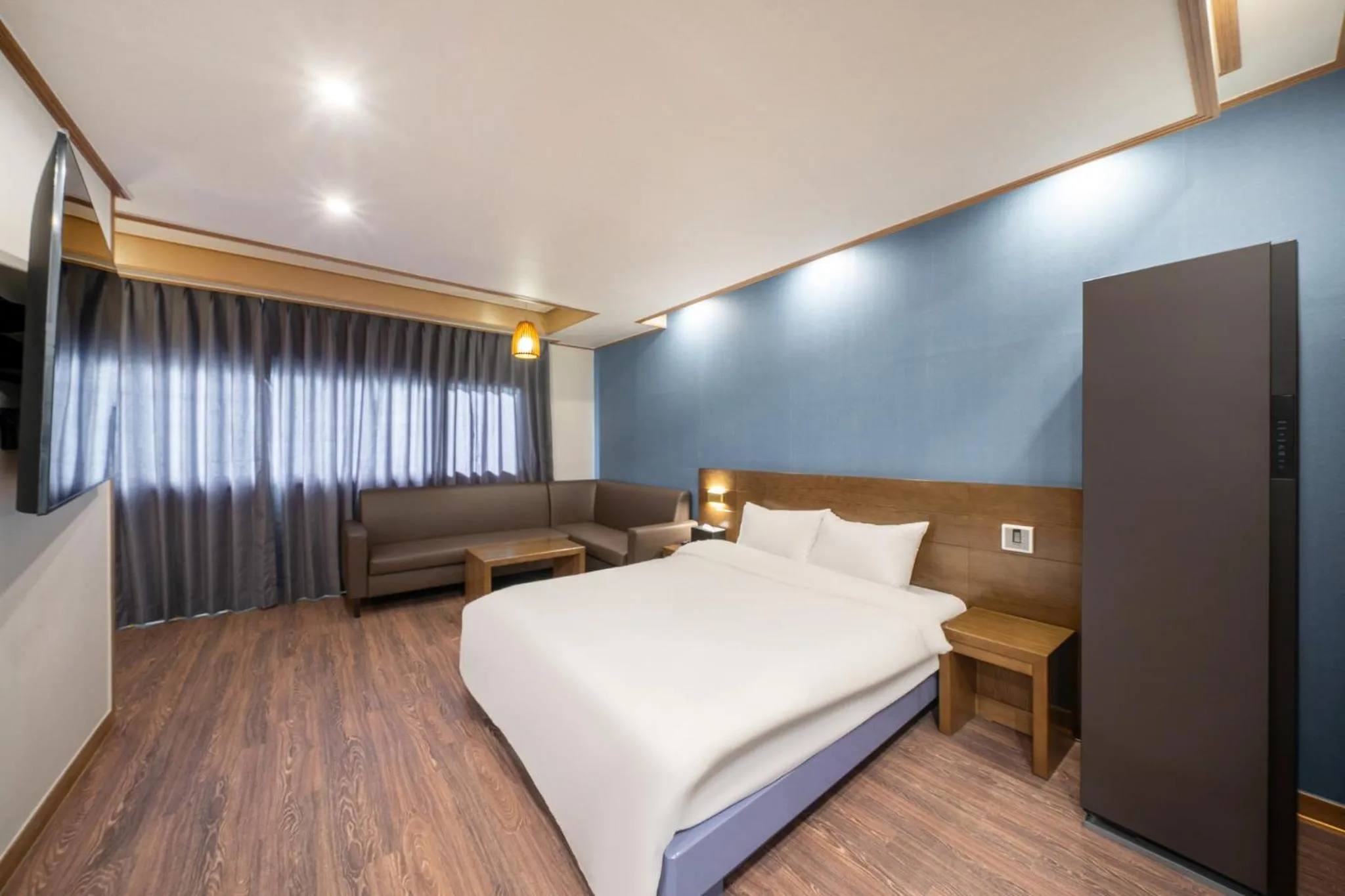 Bed in The 7 Business Hotel