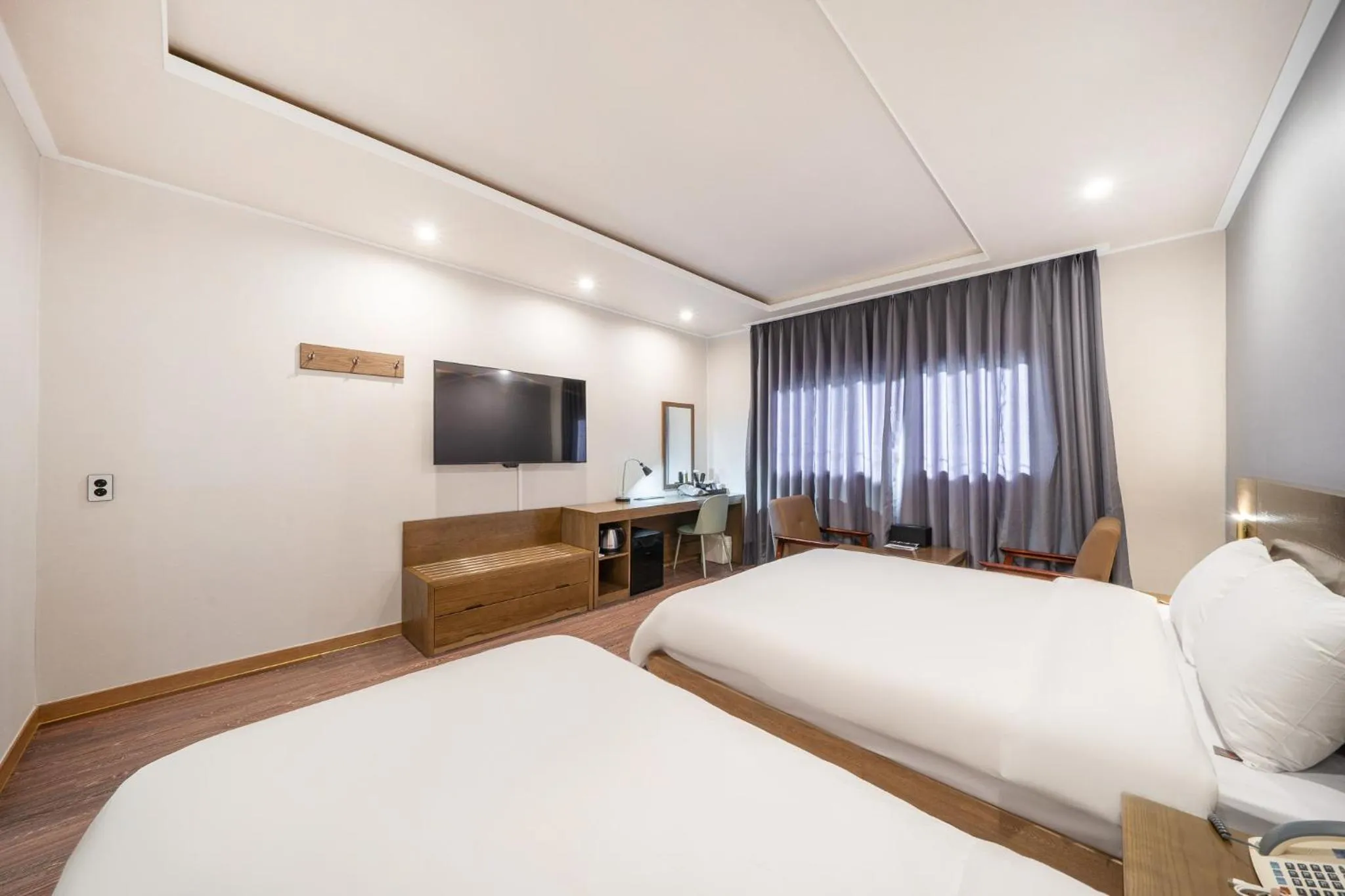 Bed in The 7 Business Hotel