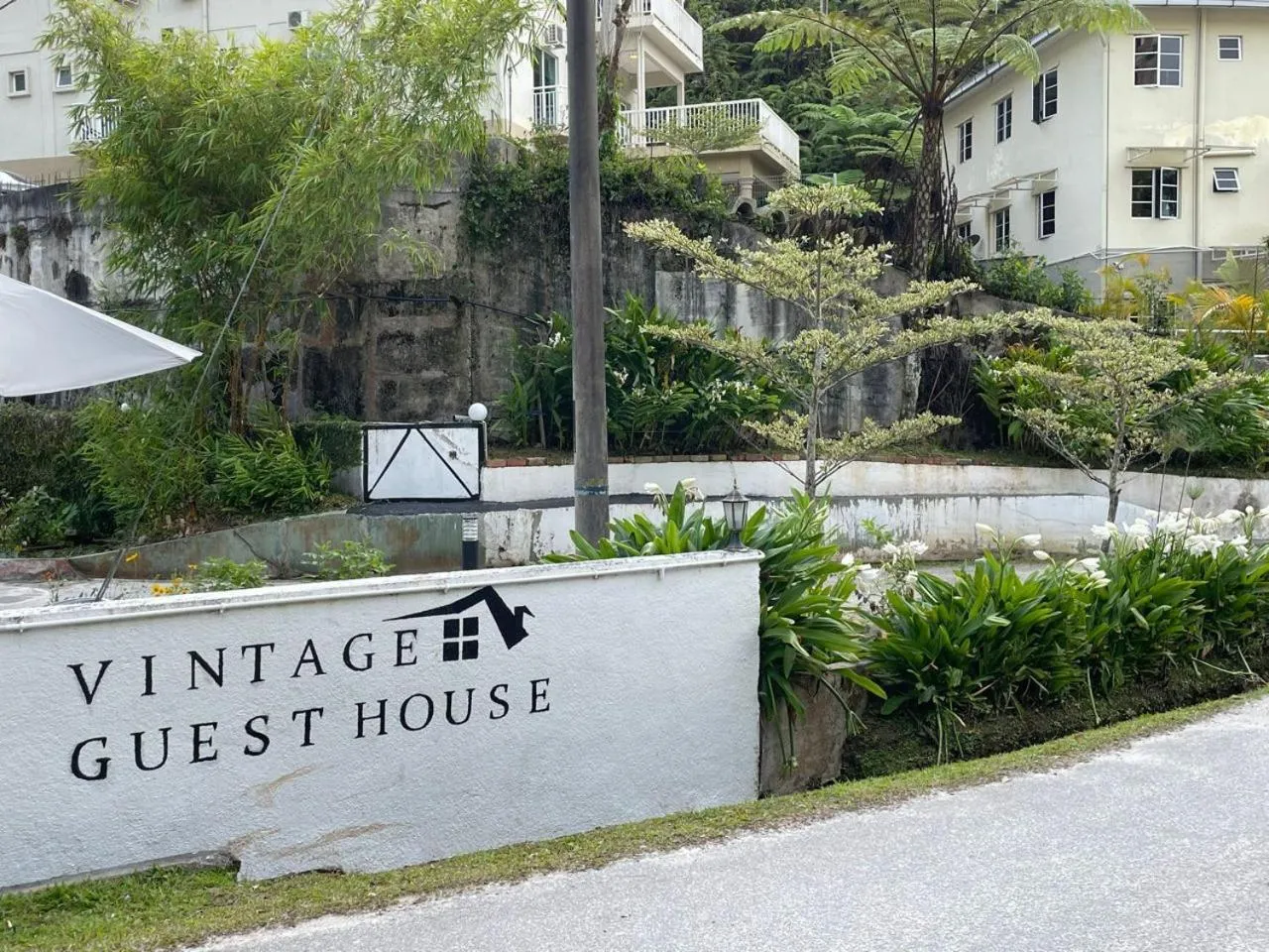 Property logo or sign in Vintage Guesthouse