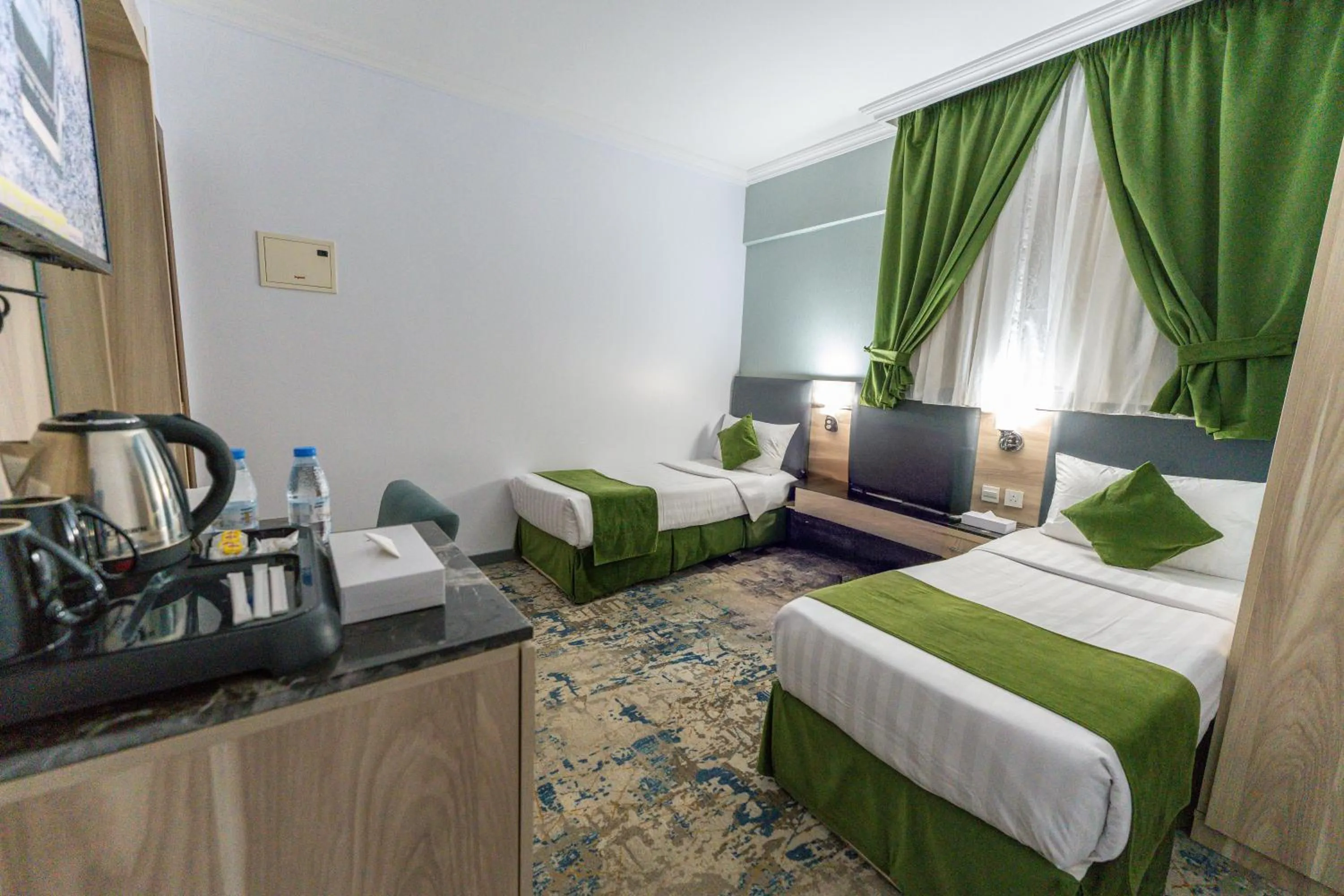 Bed in Hayah Al Masi Hotel