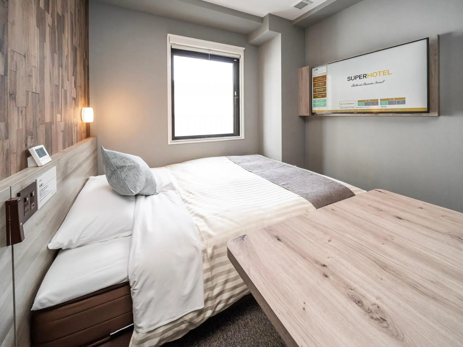 Bed in Super Hotel Premier Namba Shinsaibashi Natural Hot Spring