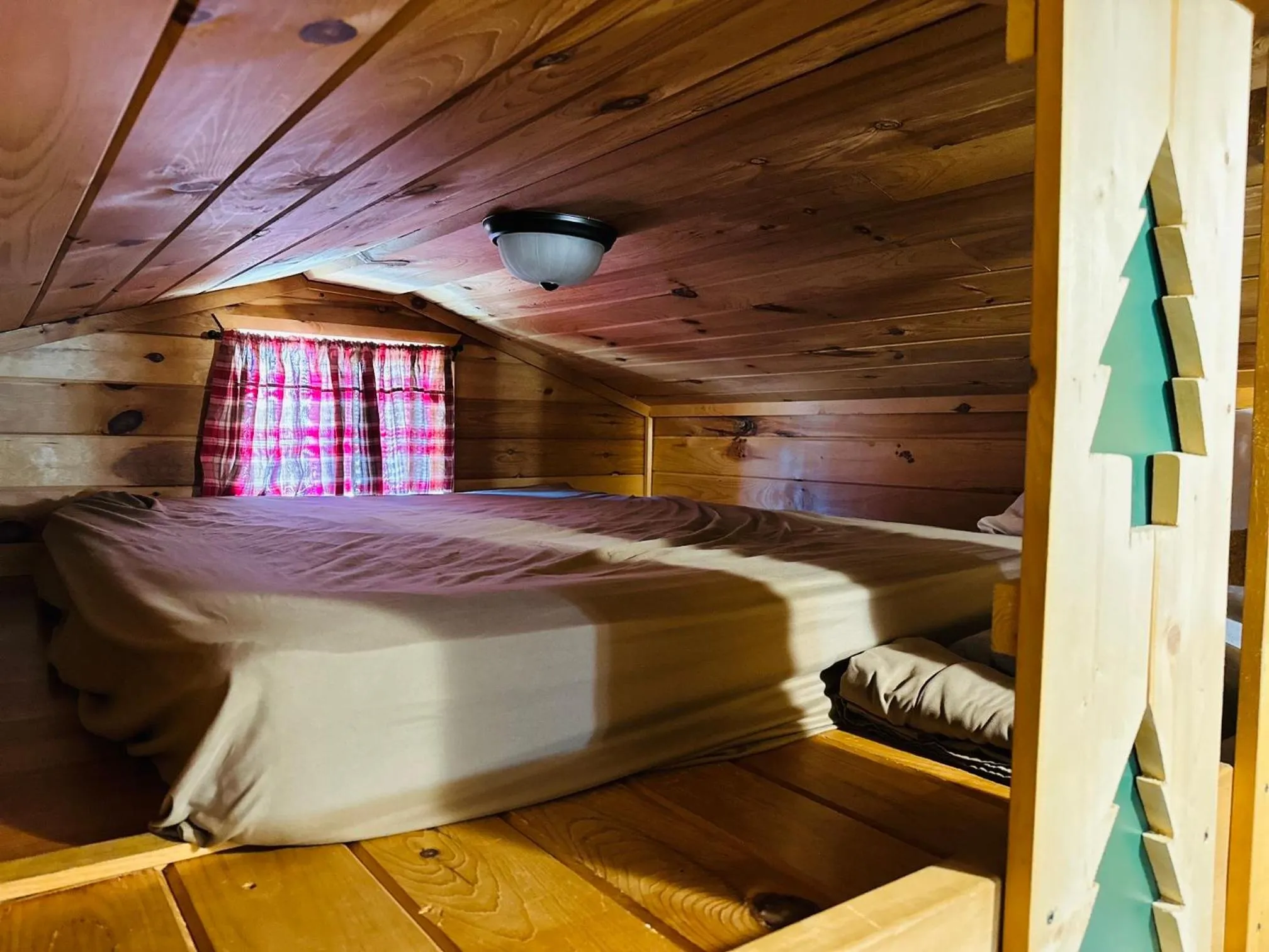 Bed in Country Cabins Hotel