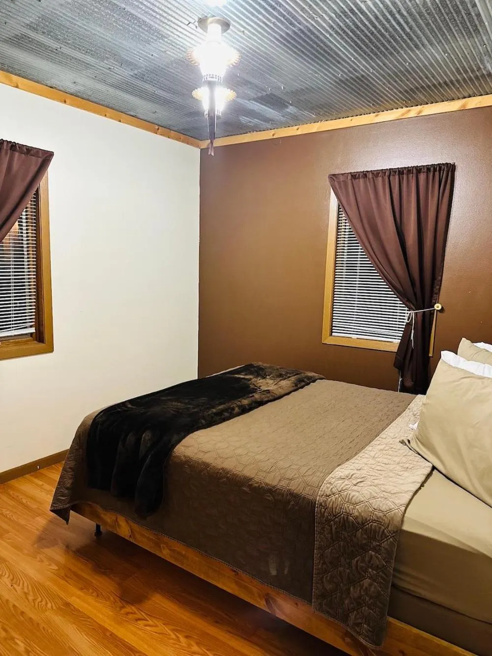 Bed in Country Cabins Hotel