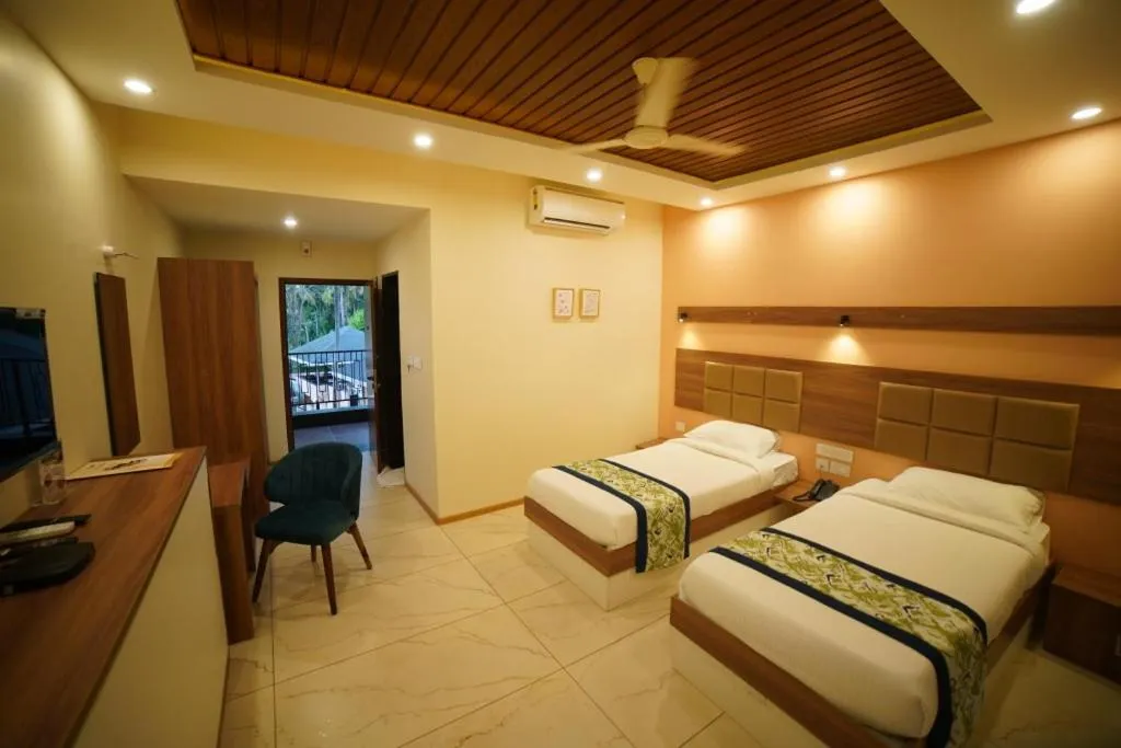 Bed in Aananda Wellness and Resorts
