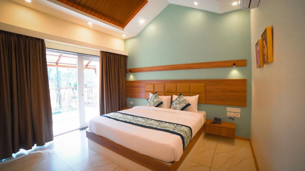 Bed in Aananda Wellness and Resorts