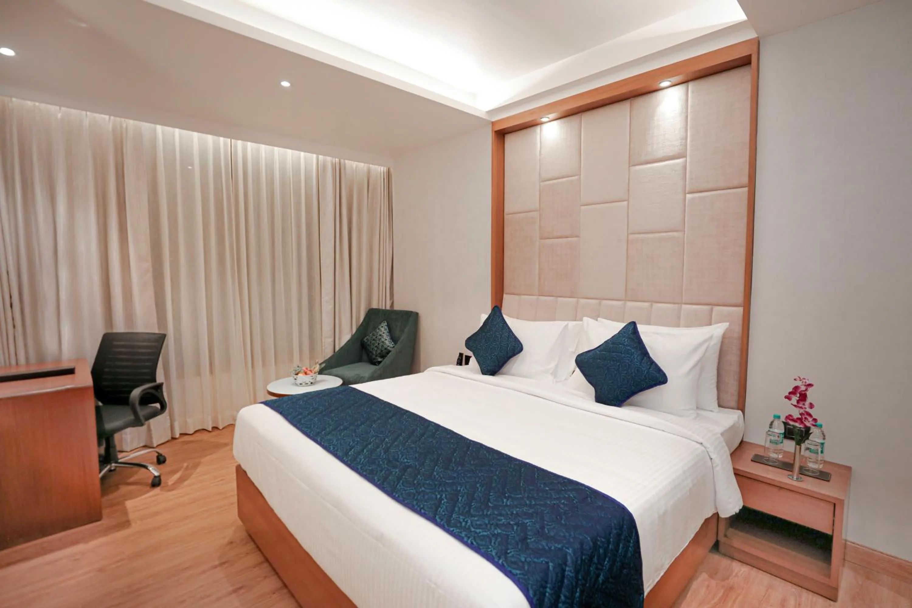 Bed in Regenta Place Bhopal by Royal Orchid Hotels Limited