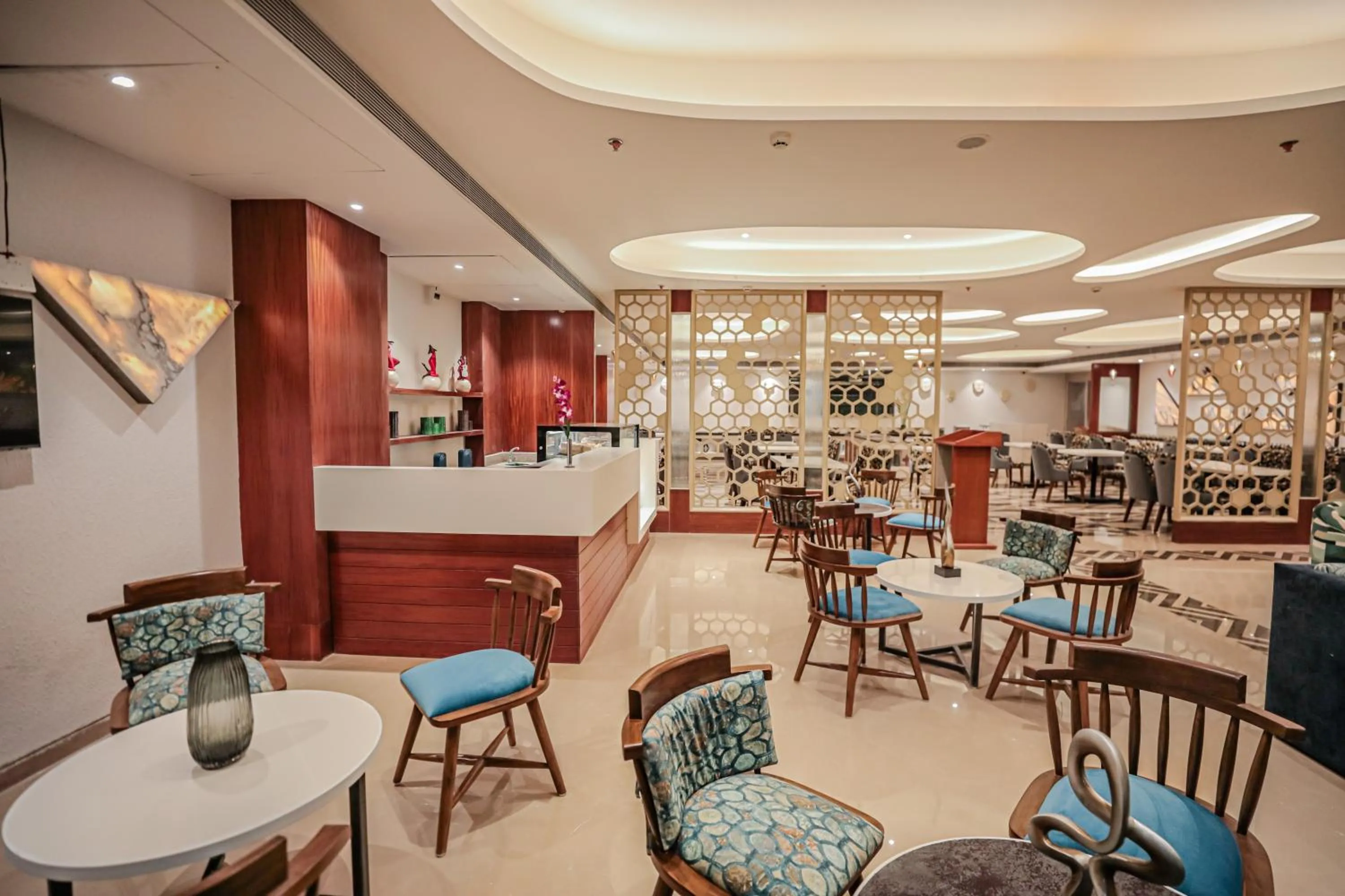 Communal lounge/ TV room in Regenta Place Bhopal by Royal Orchid Hotels Limited