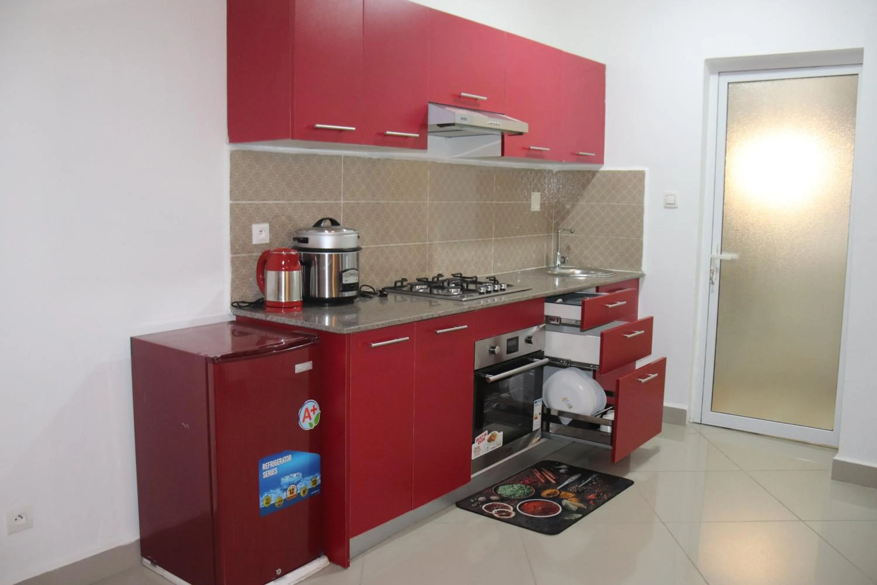 Kitchen or kitchenette in Hary's Aparthotel