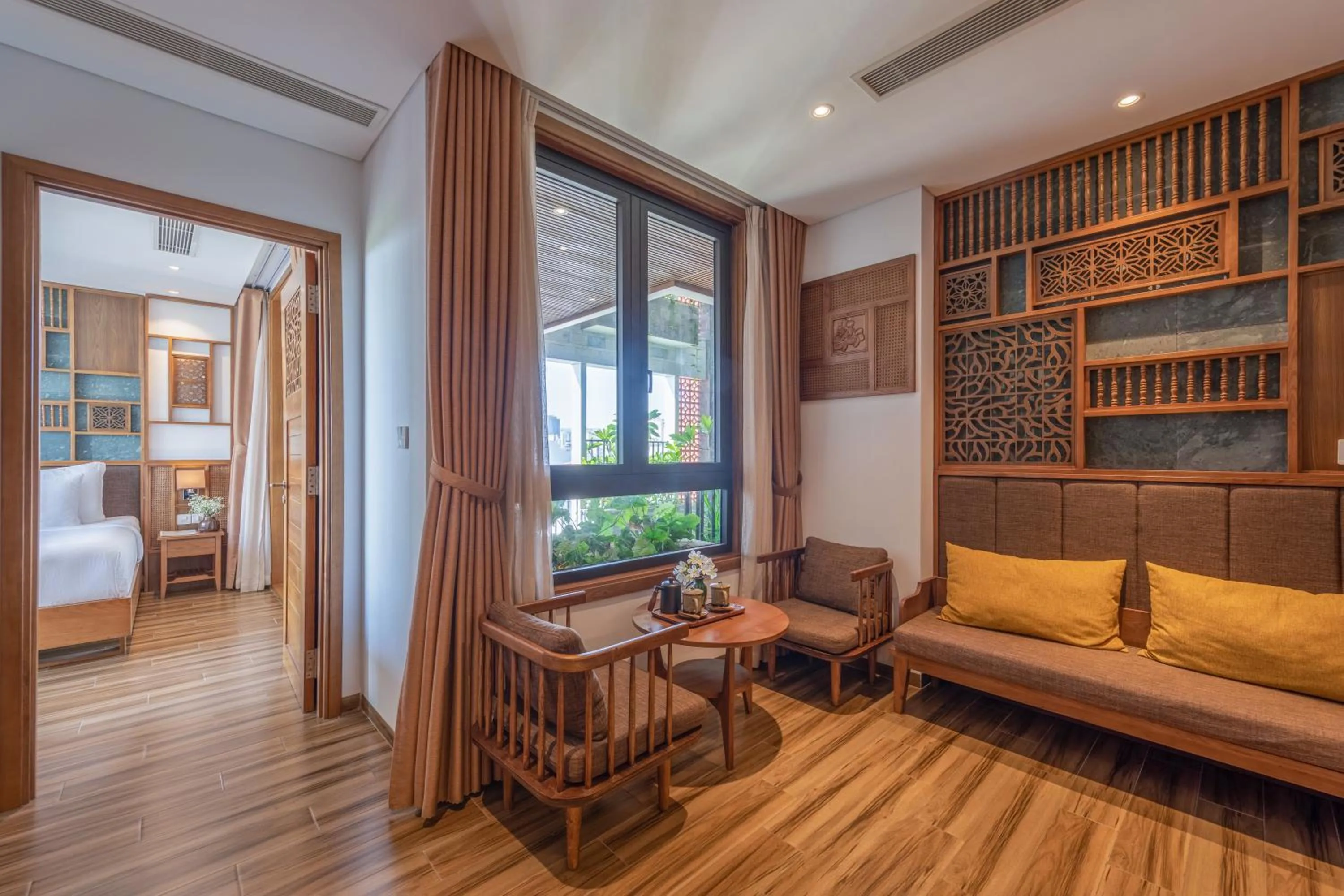 Seating area, Bed in Bonny Boutique Hotel Da Nang