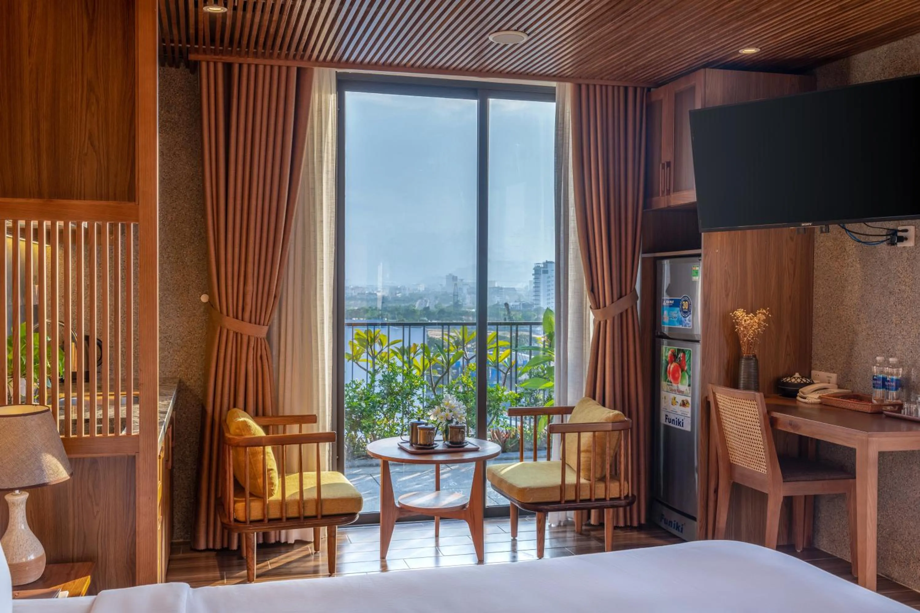 Photo of the whole room, Bed in Bonny Boutique Hotel Da Nang