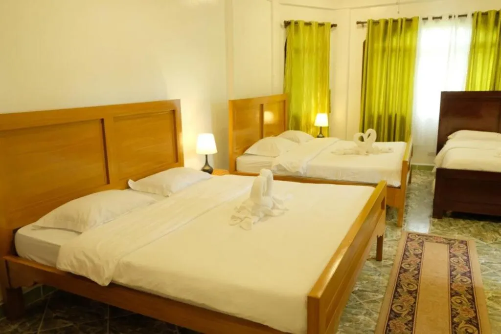 Bed in Villa Italia Hotel