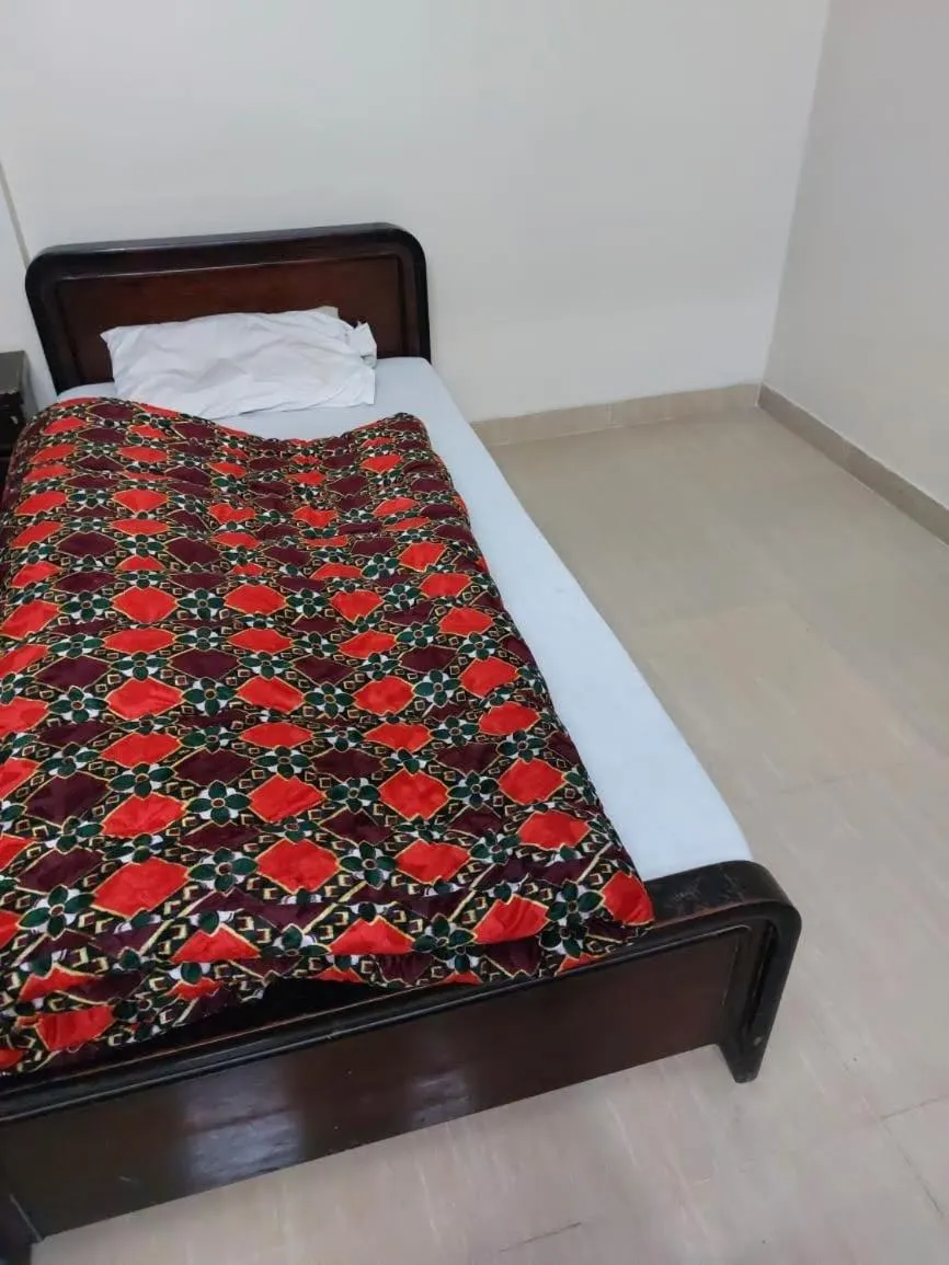 Bed in Al Sakhawat Hotel