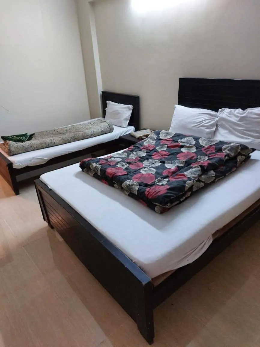 Bed in Al Sakhawat Hotel