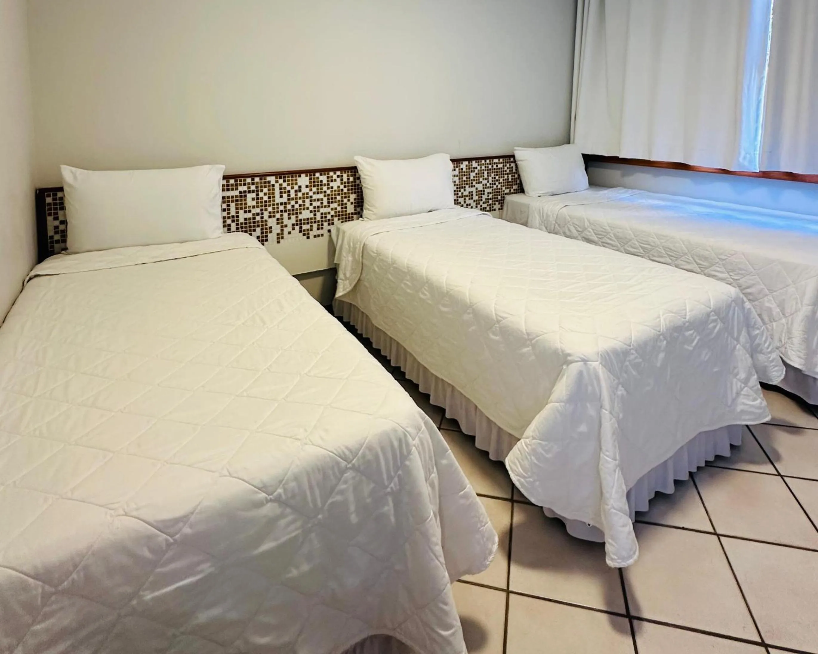 Bed in Porty Brasil Hotel