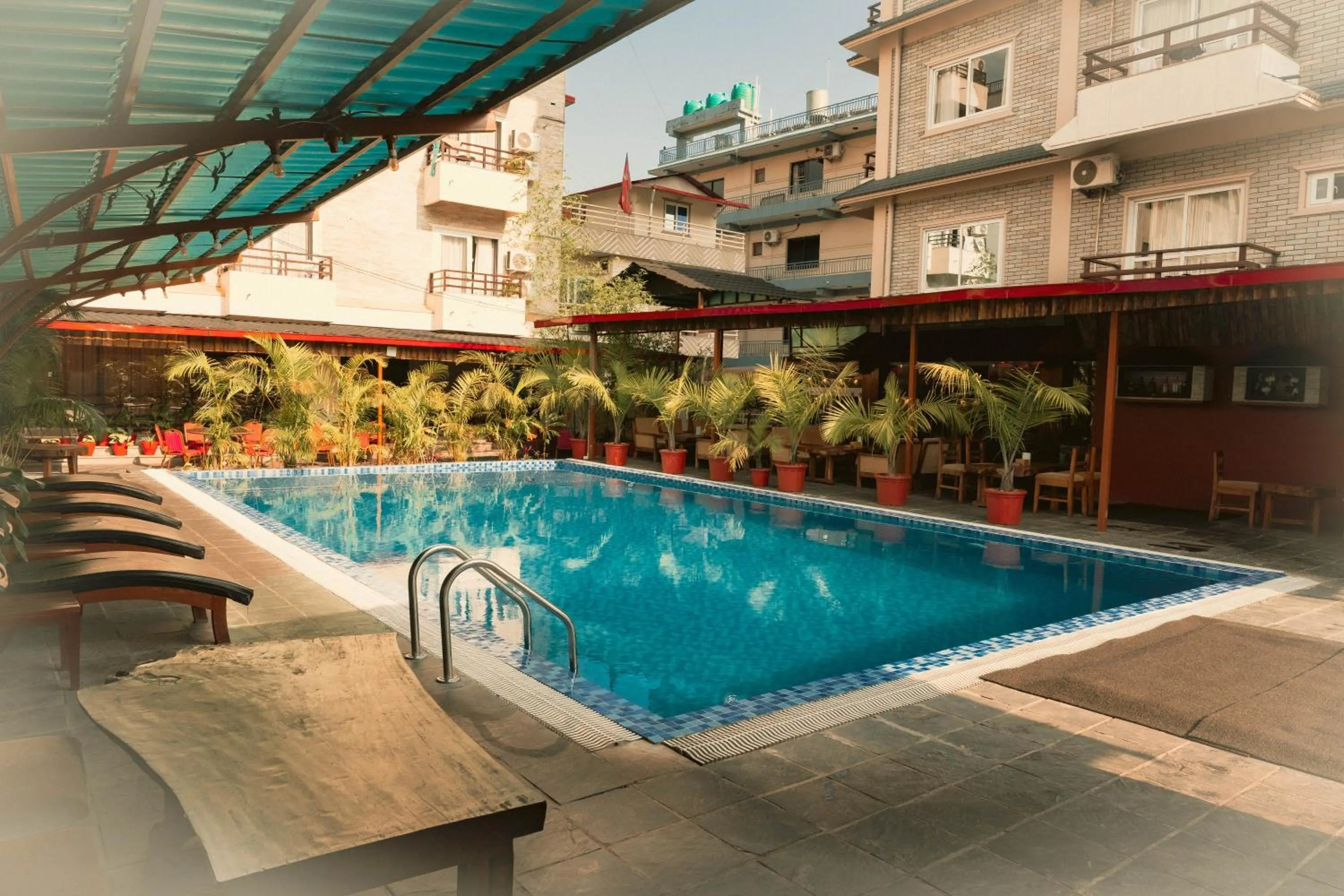 Swimming pool in Majheri Resort and Spa