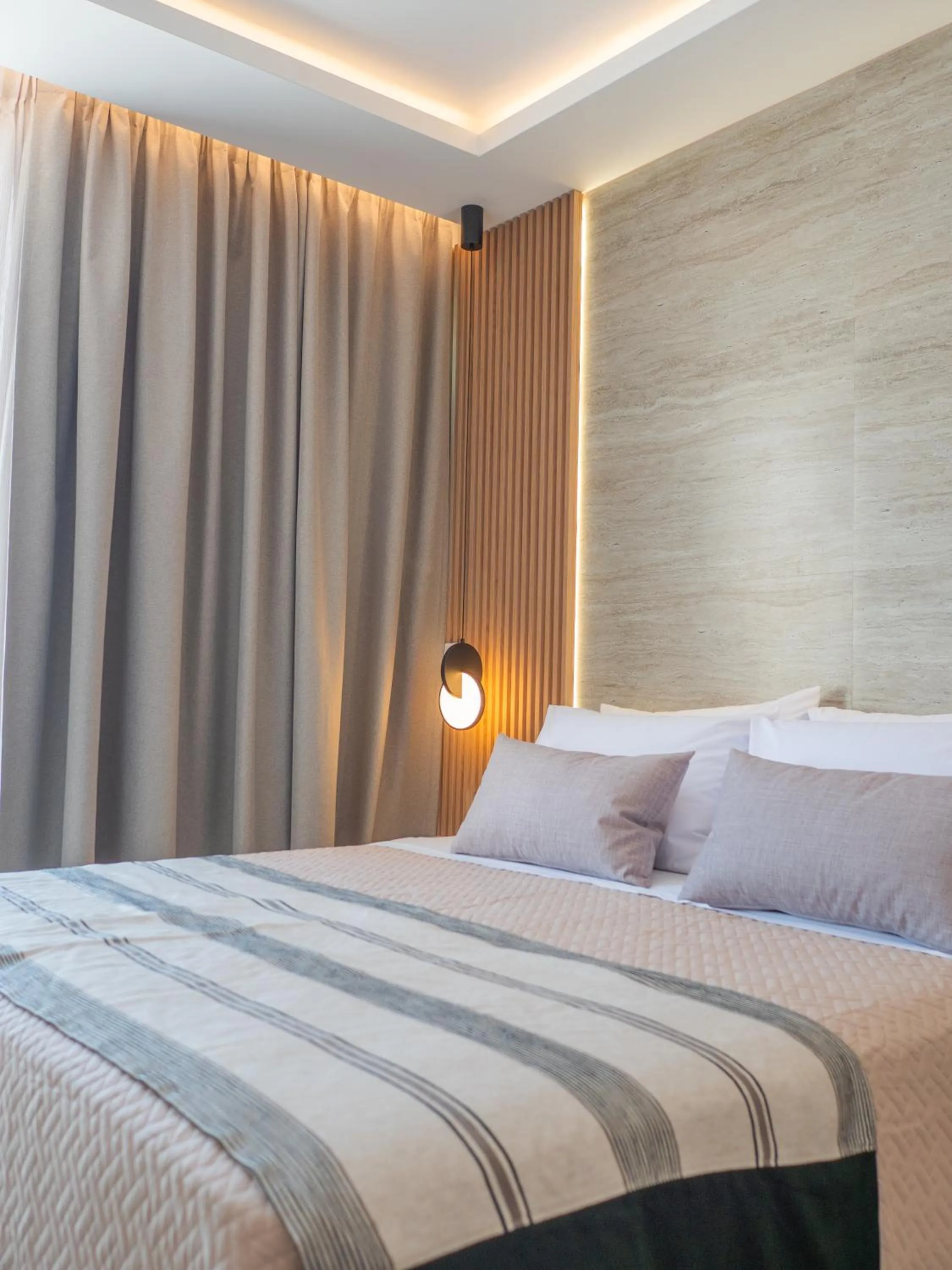 Bed in Poseidon Hotel