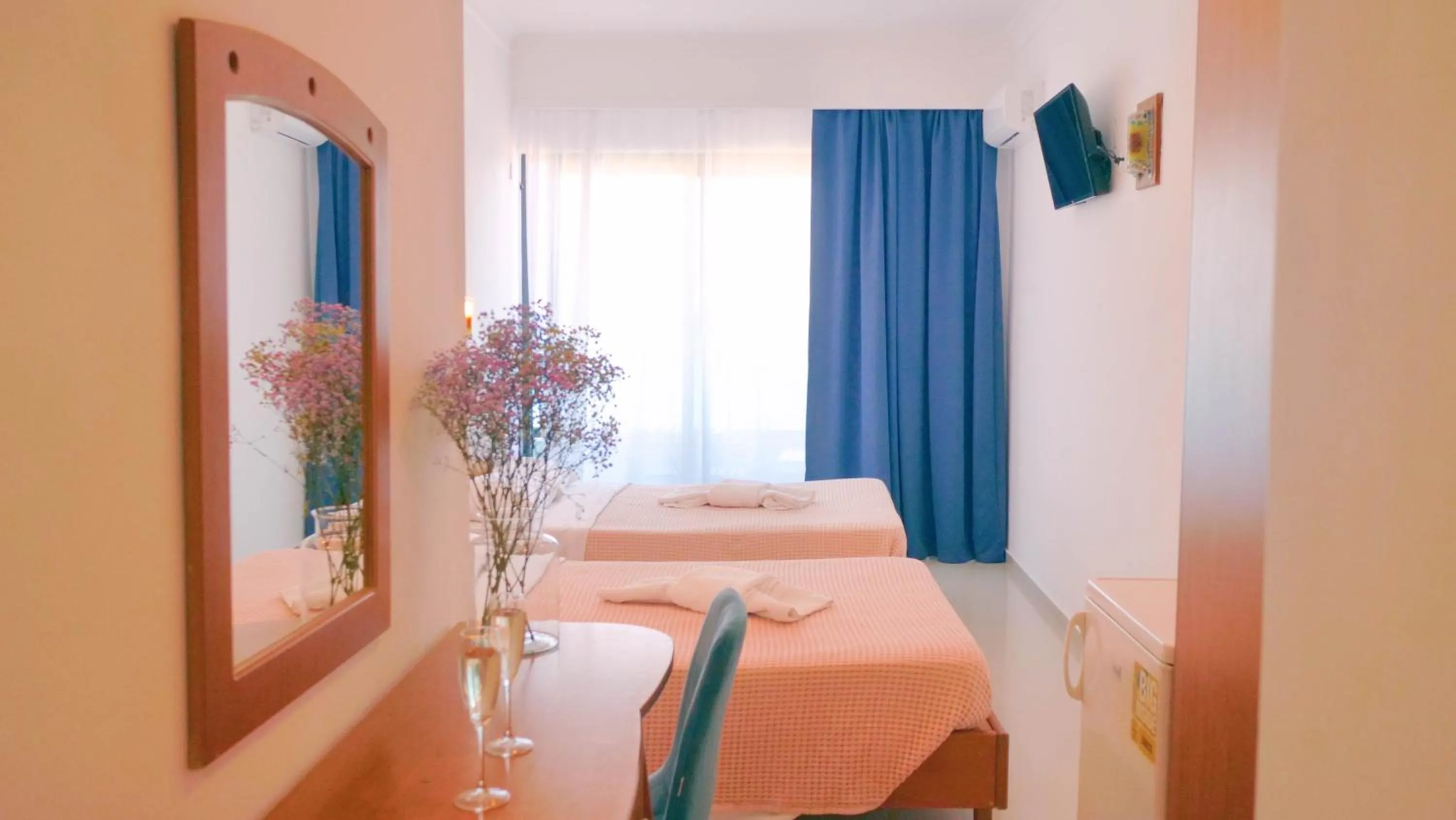 Bed in Poseidon Hotel