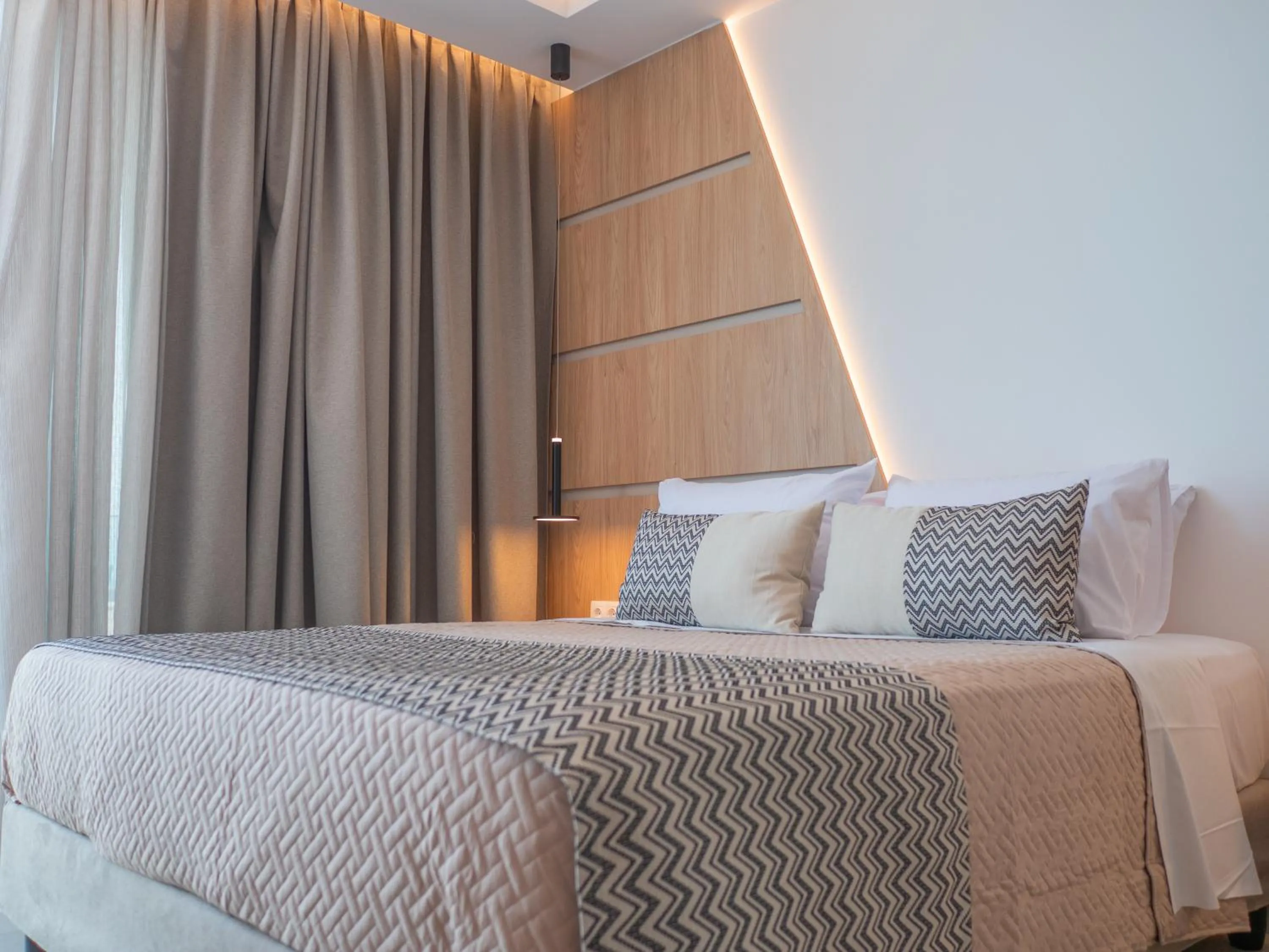 Bed in Poseidon Hotel