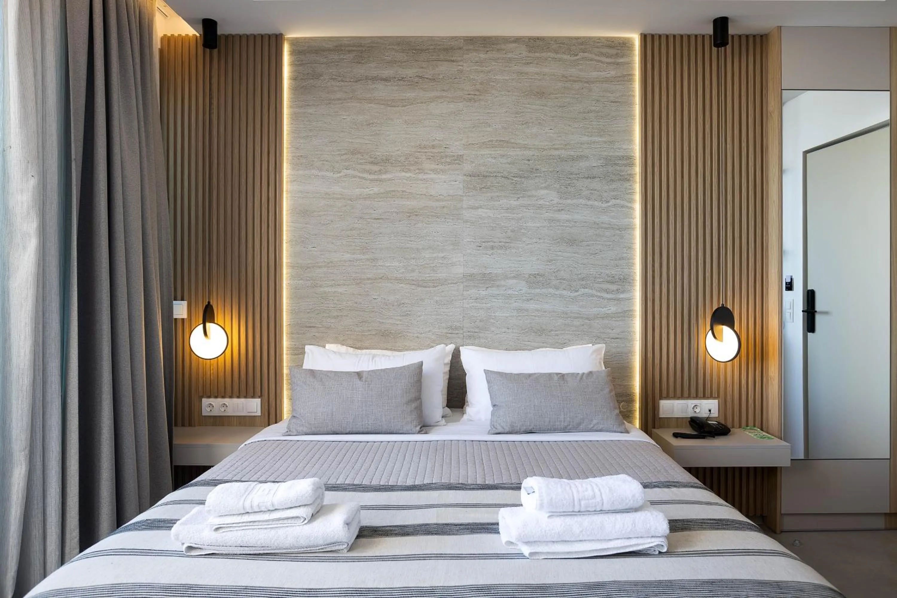 Bed in Poseidon Hotel