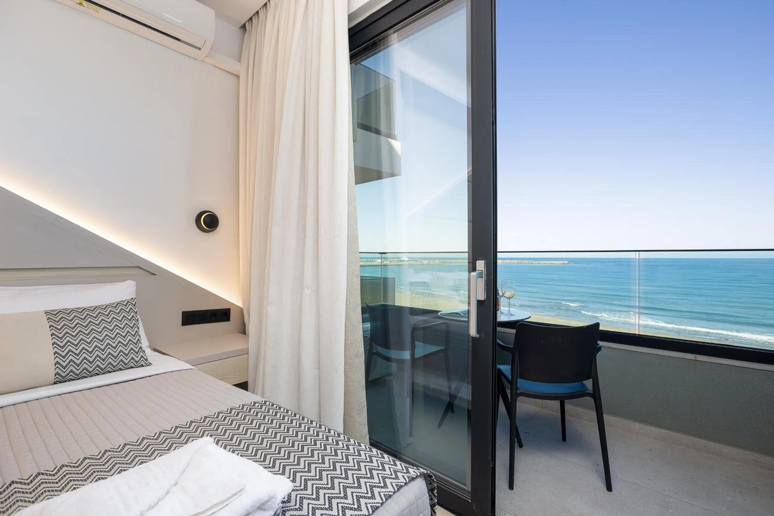 Bed in Poseidon Hotel