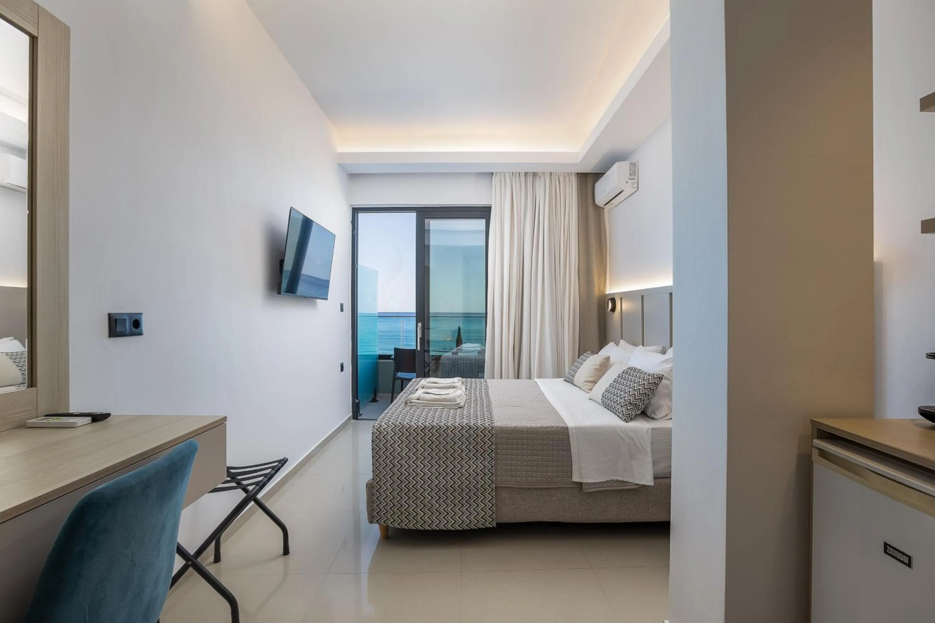 Bed in Poseidon Hotel