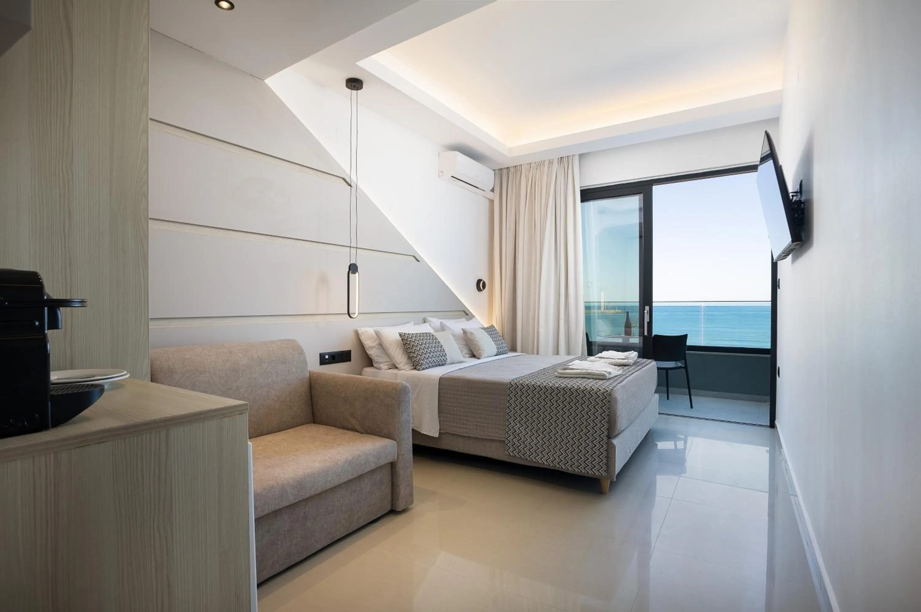 Bed in Poseidon Hotel