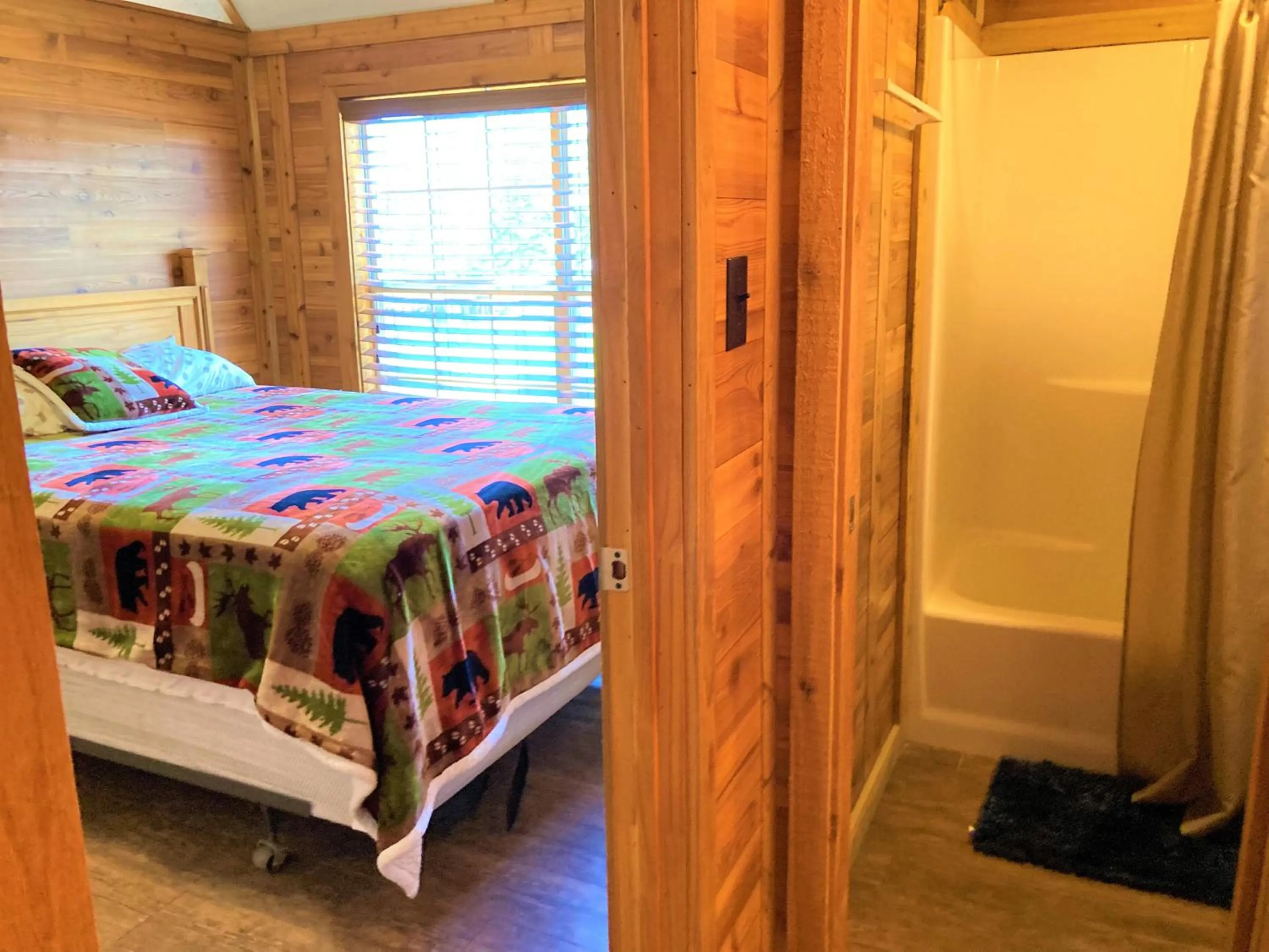 Photo of the whole room, Bed in Outback Campground and Marina