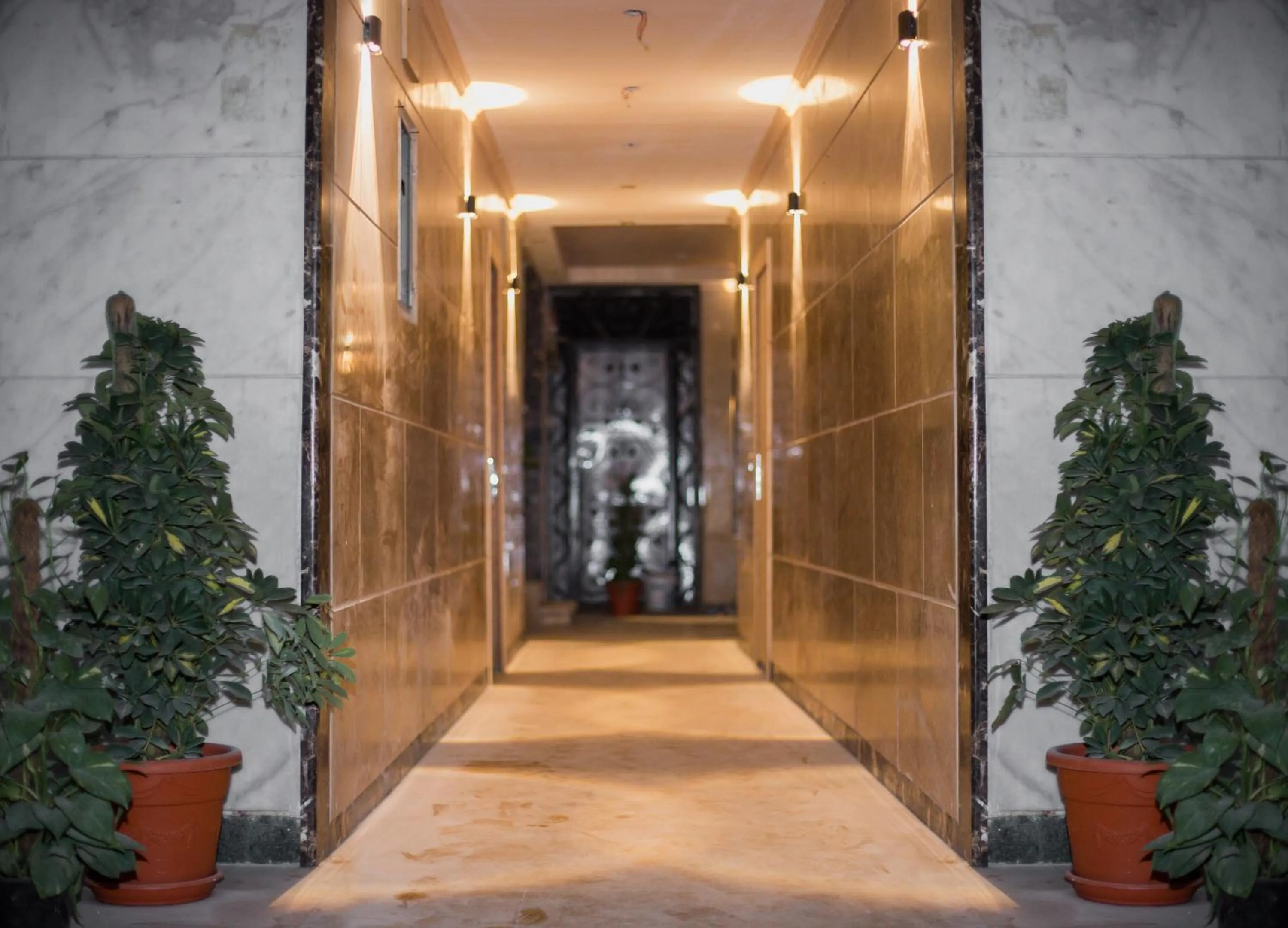 Facade/entrance in Asia Grand Museum & Pyramids view