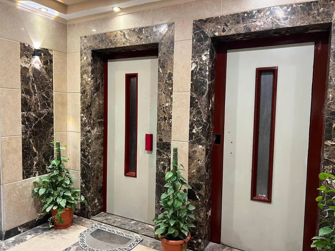 elevator in Asia Grand Museum & Pyramids view