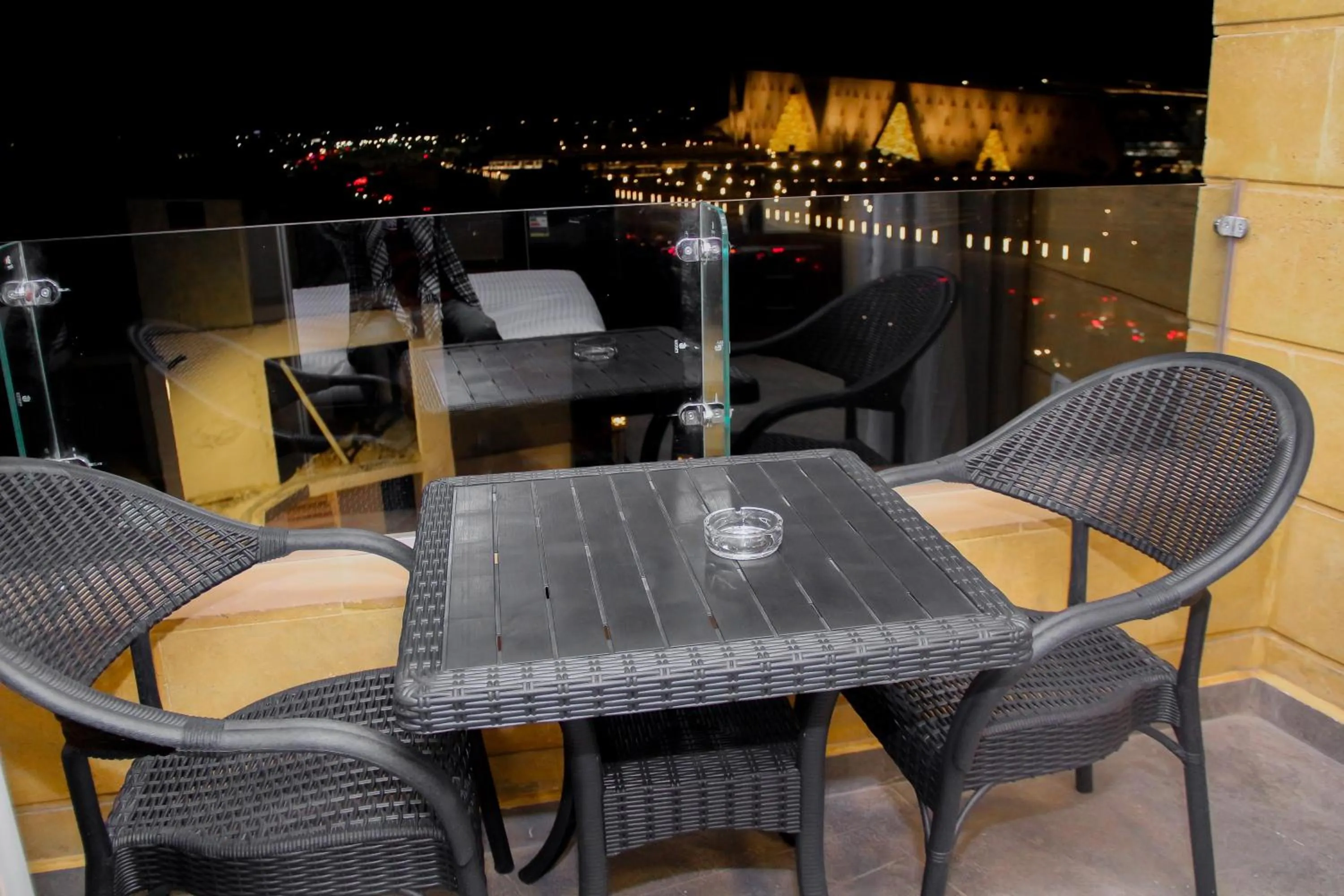 Night in Asia Grand Museum & Pyramids view