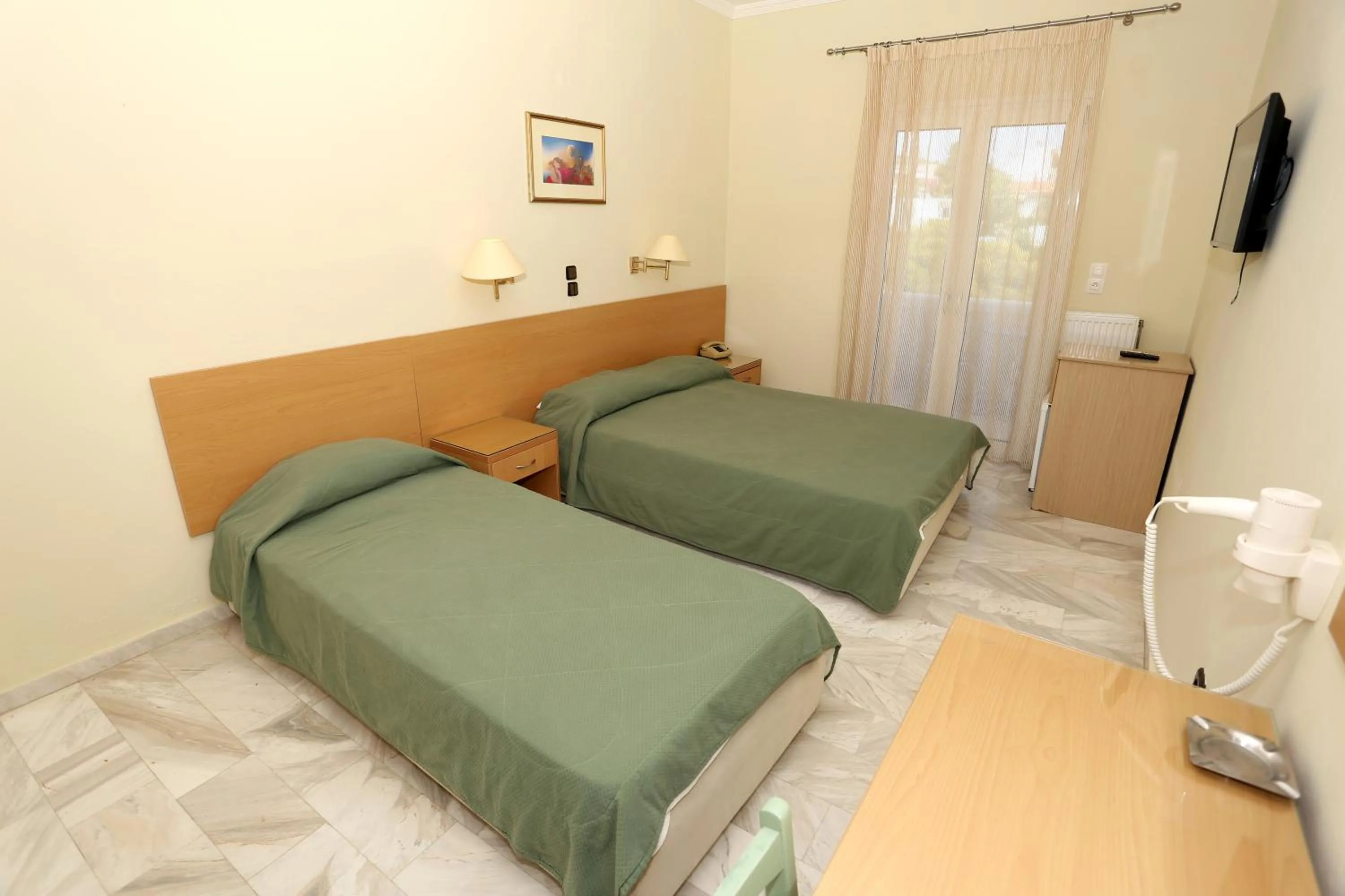 Bed in Katerina Hotel