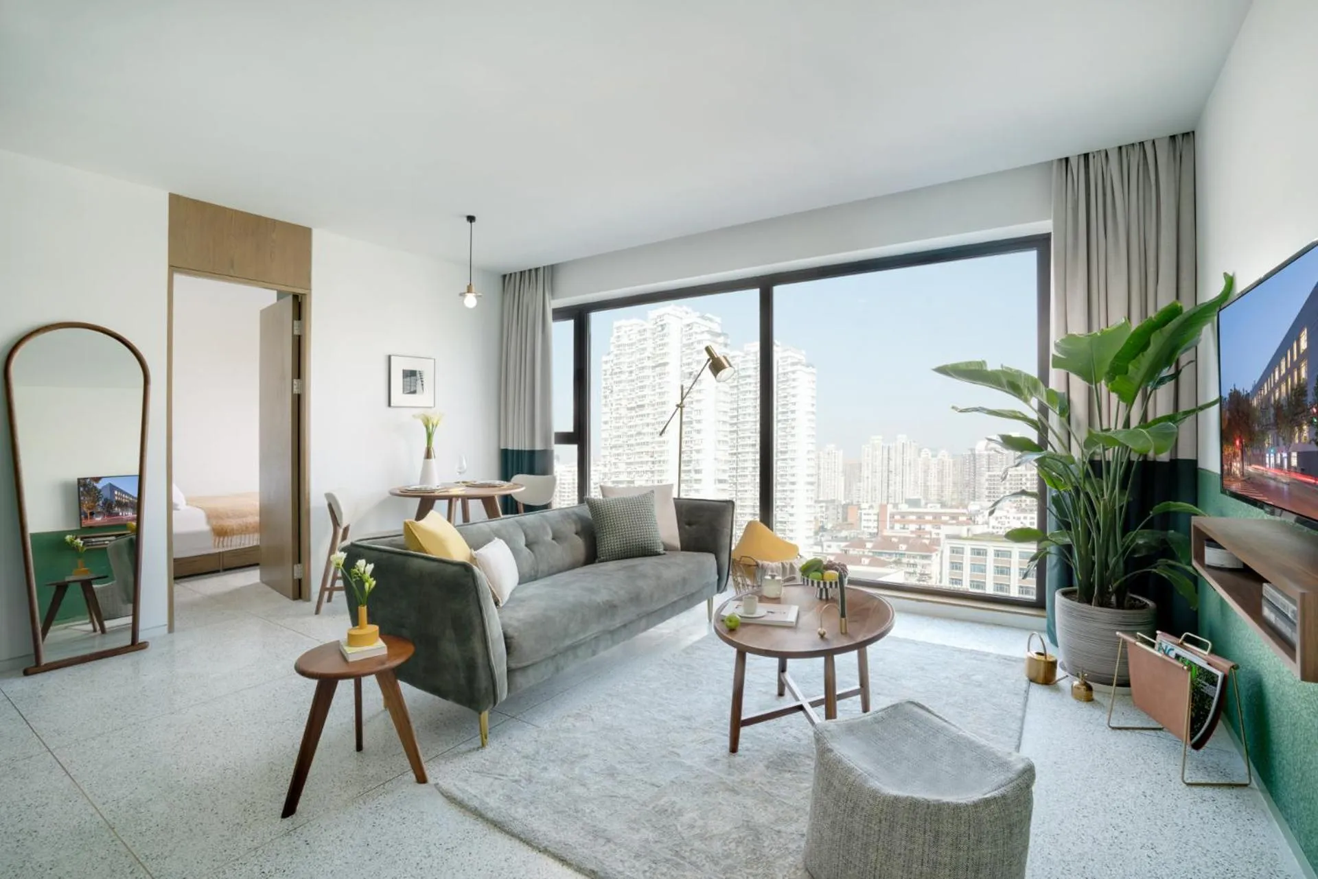 Living room in basePLUS-Shanghai BINJIANG Serviced Apartment - In room Washing Machine with Dryer function & Kitchen & Free 24hrs Coffee & Close to Expo Museum, Xintiandi & Subway nearby & English speaking & High speed free WiFi